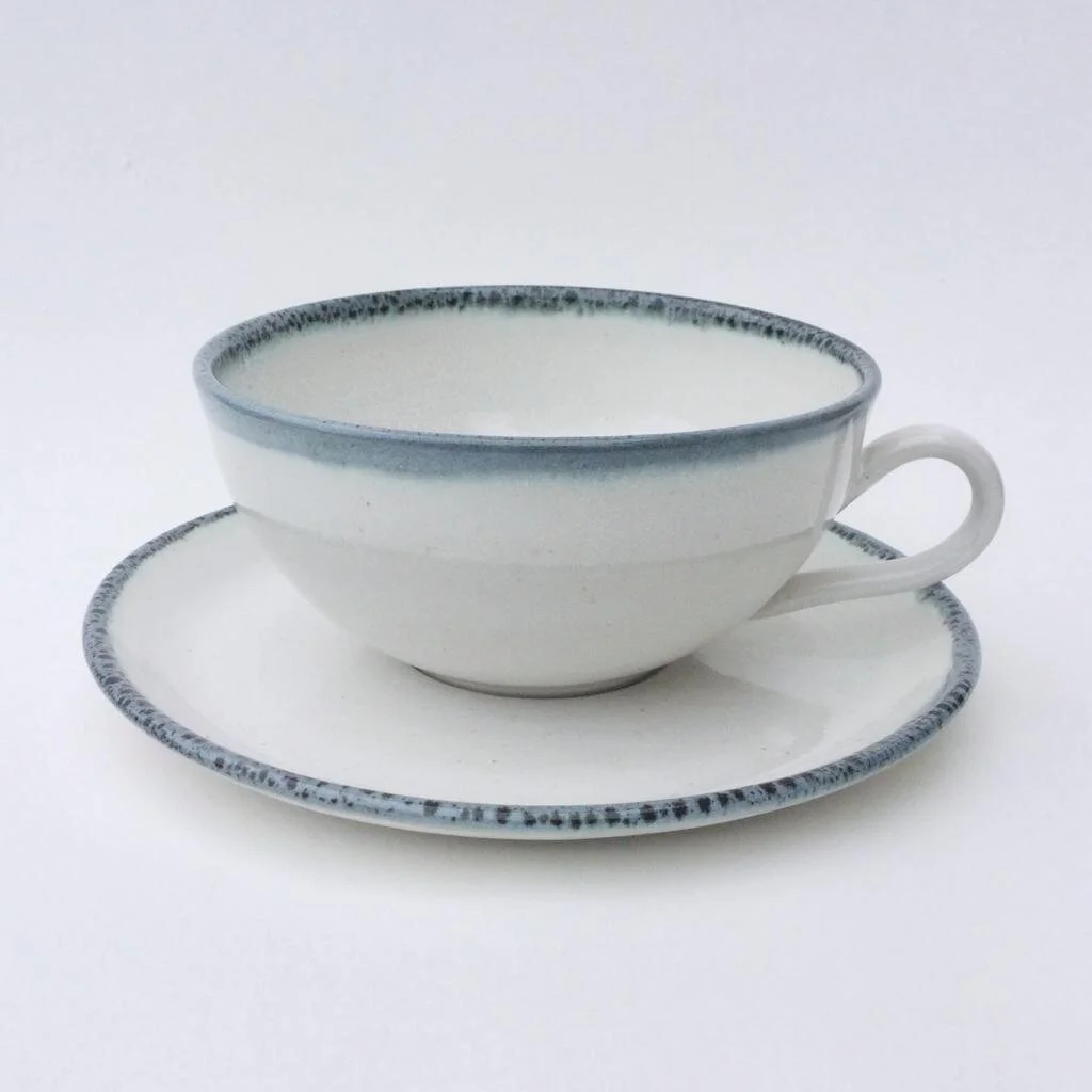 Cappucino cup in seafoam rim 1.jpeg