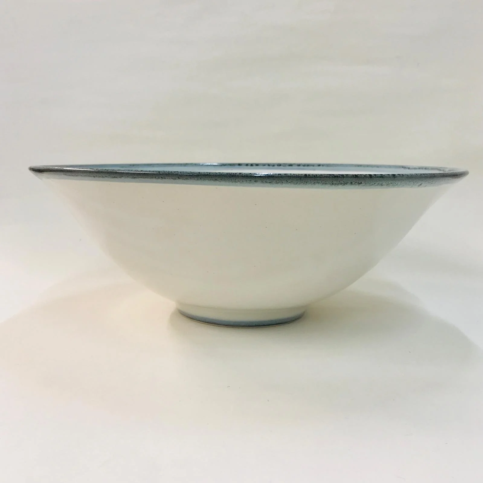 Larger bowl in seafoam rim and foot 1.jpeg