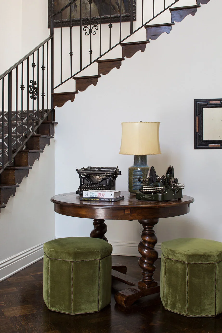 Traditional-Staircase-Entry-Vintage-Typewriter-Wrought-Iron-Railing-Perfitt-Richards.webp