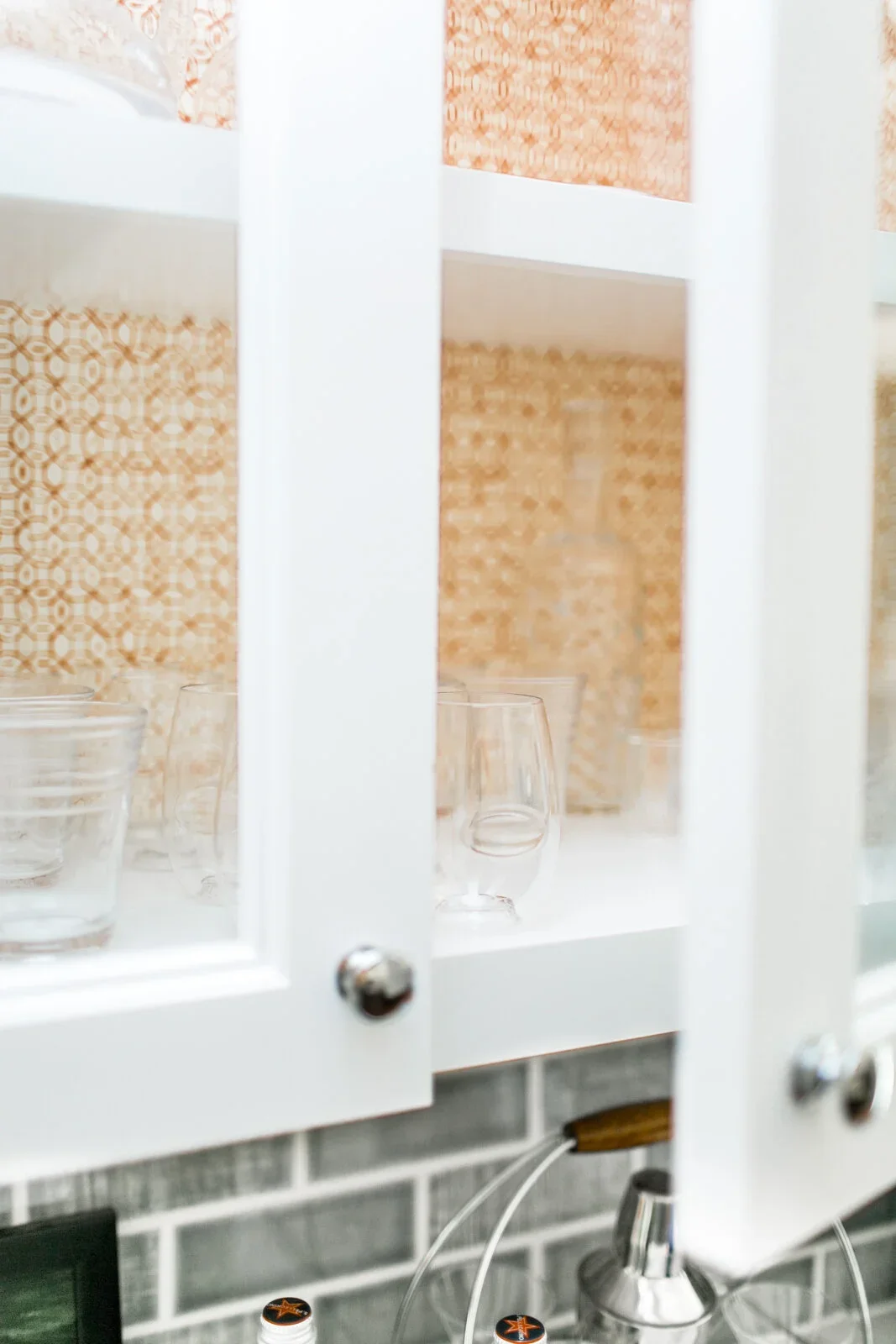 White-Cabinets-Wallpaper-Lined-Perfitt-Richards-Interior-Design.webp