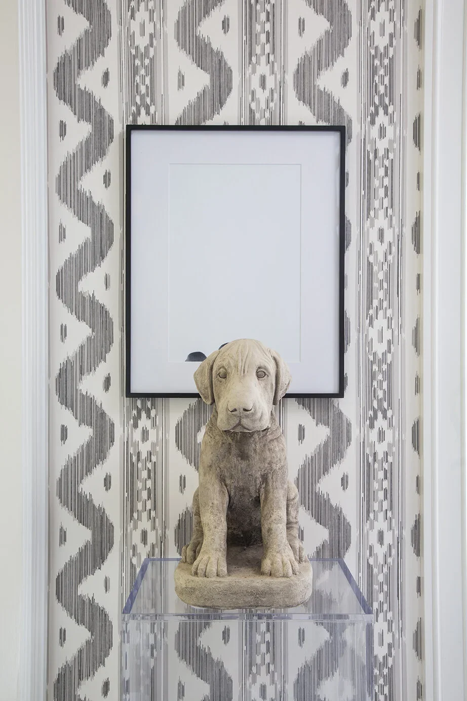 Tribal-Pattern-Wallpaper-Ikat-Black-White-Dog-Sculpture-Perfitt-Richards-Interior-Design.webp