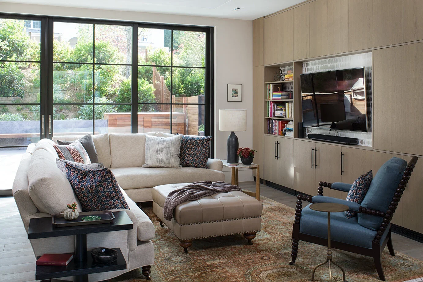Contemporary-Family-Room-Steel-French-Doors-Modern-Media-Cabinet-Perfitt-Richards-Interior-Design.webp