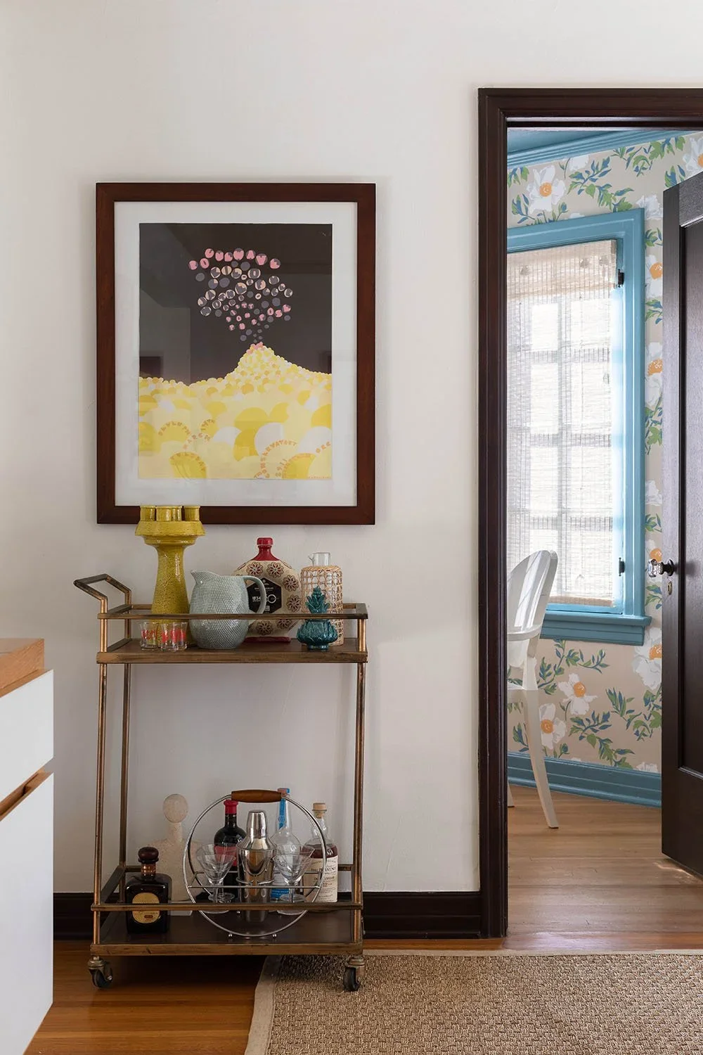 06-Original-Artwork-hanging-above-vintage-bar-cart-perfitt-richards-interior-design.webp