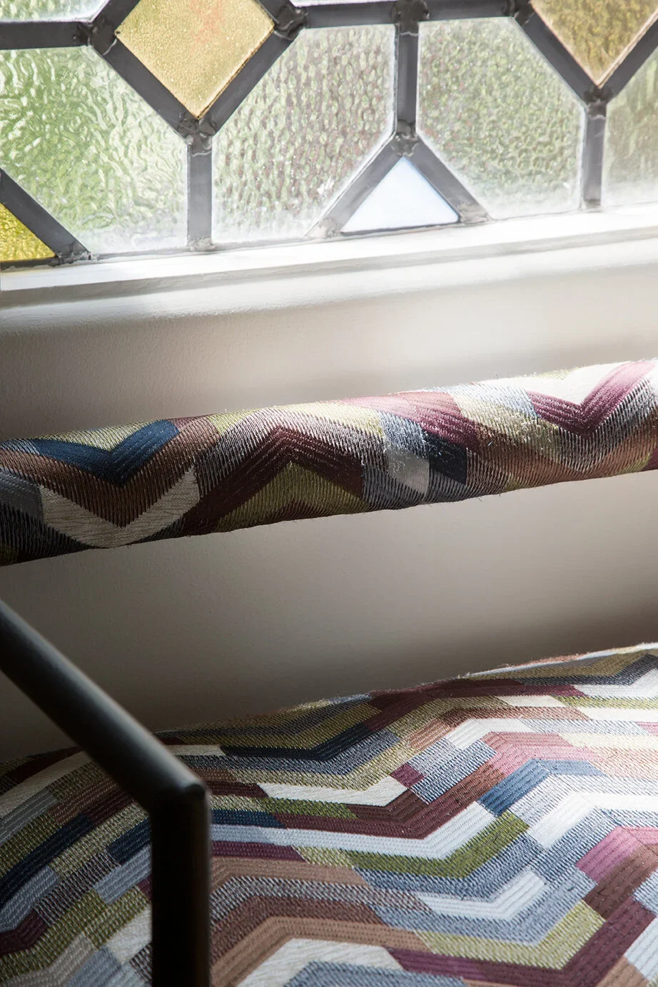 Stained-Glass-Window-Entry-Seating-Perfitt-Richards-Interior-Design.webp