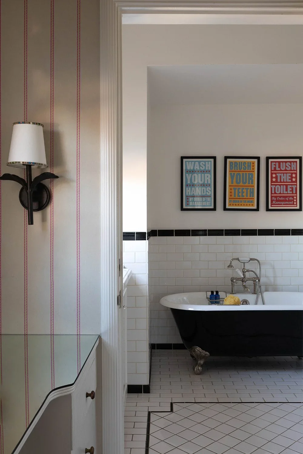 08-view-into-black-and-white-bathroom-perfitt-richards-interior-design.webp