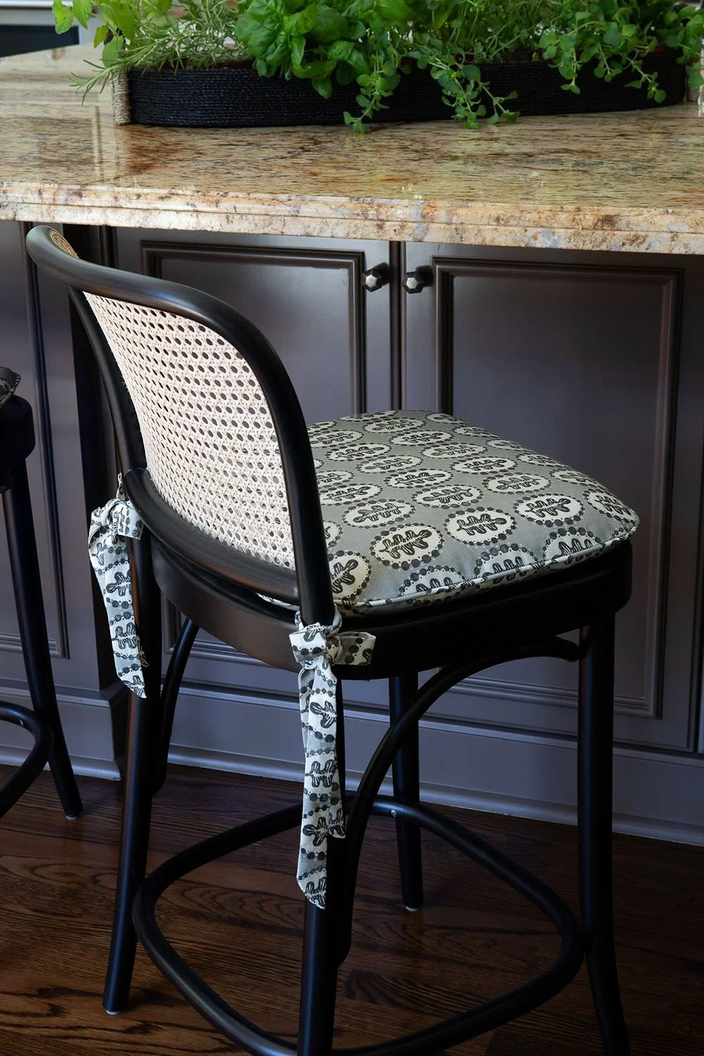 13-cane-back-barstool-with-patterned-cushion-perfitt-richards-interior-design.webp