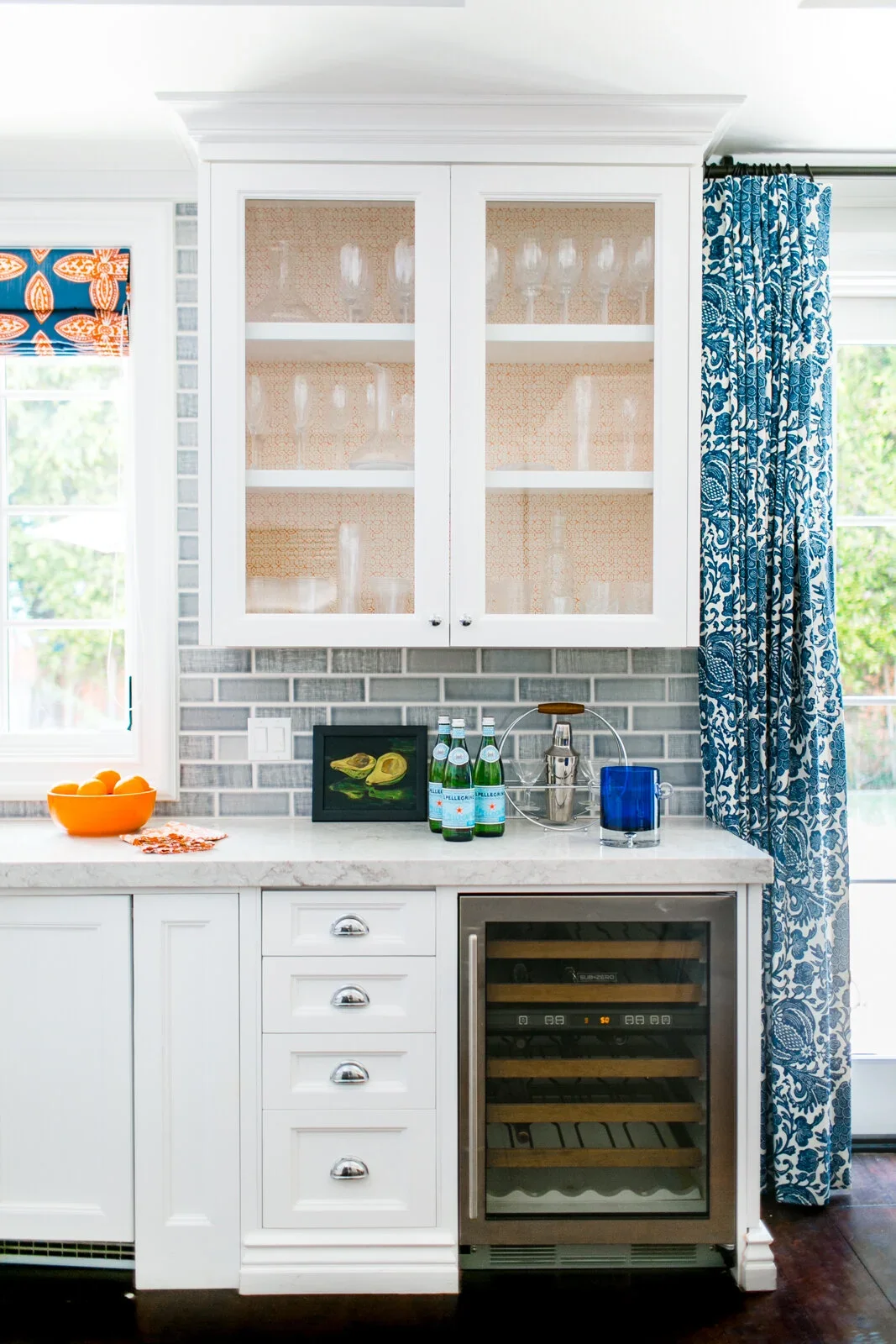 White-Cabinets-Wine-Refrigerator-Contemporary-Kitchen-Perfitt-Richards-Interior-Design.webp