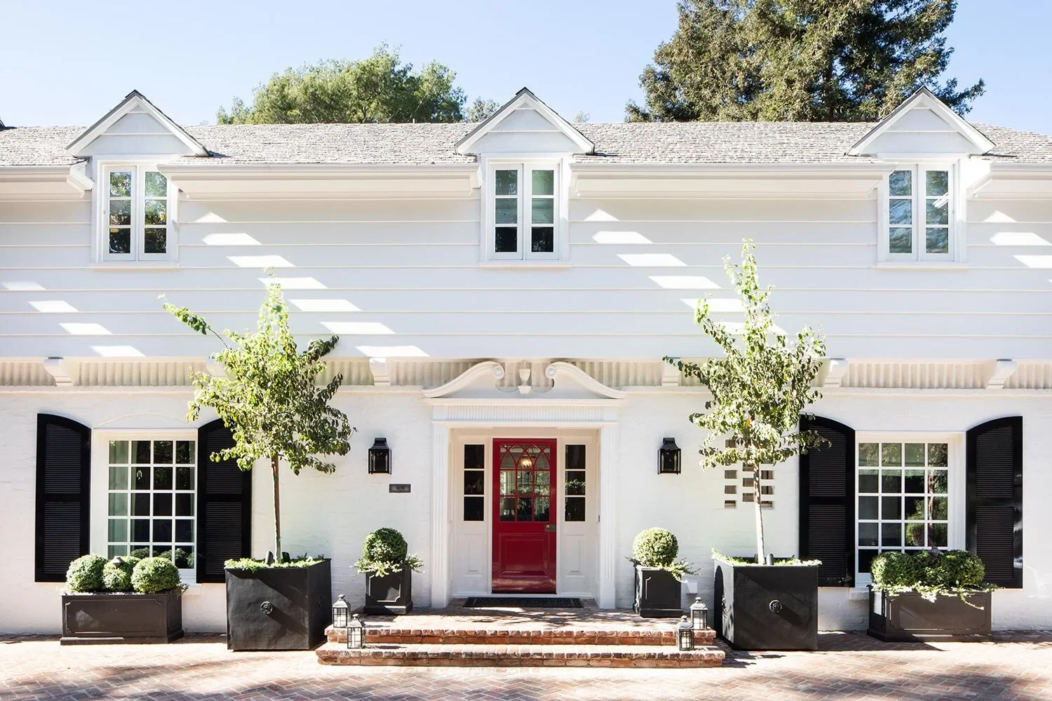 Traditional-Home-Front-Exterior-Red-Door-Perfitt-Richards-Design.webp