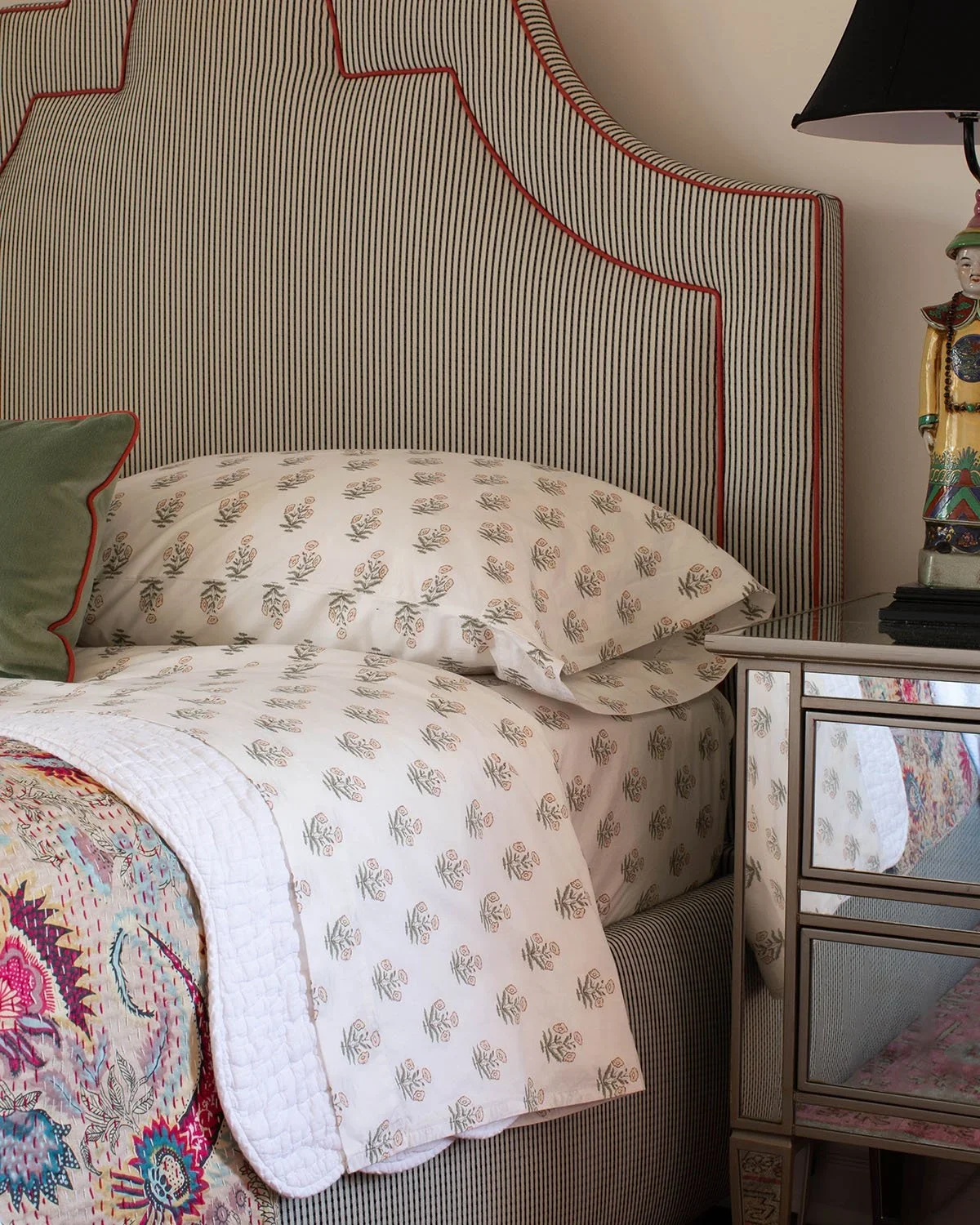 04-bedroom-with-pattern-play-bedding-and-headboard-perfitt-richards-interior-design.webp