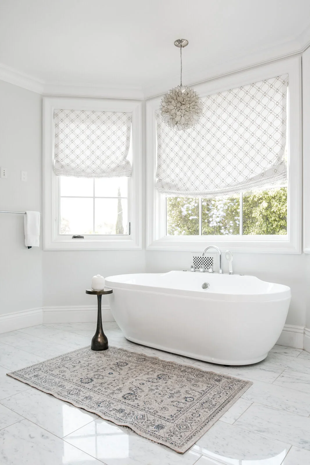 White-Master-Bathroom-Freestanding-Tub-Marble-Floors-Perfitt-Richards.webp