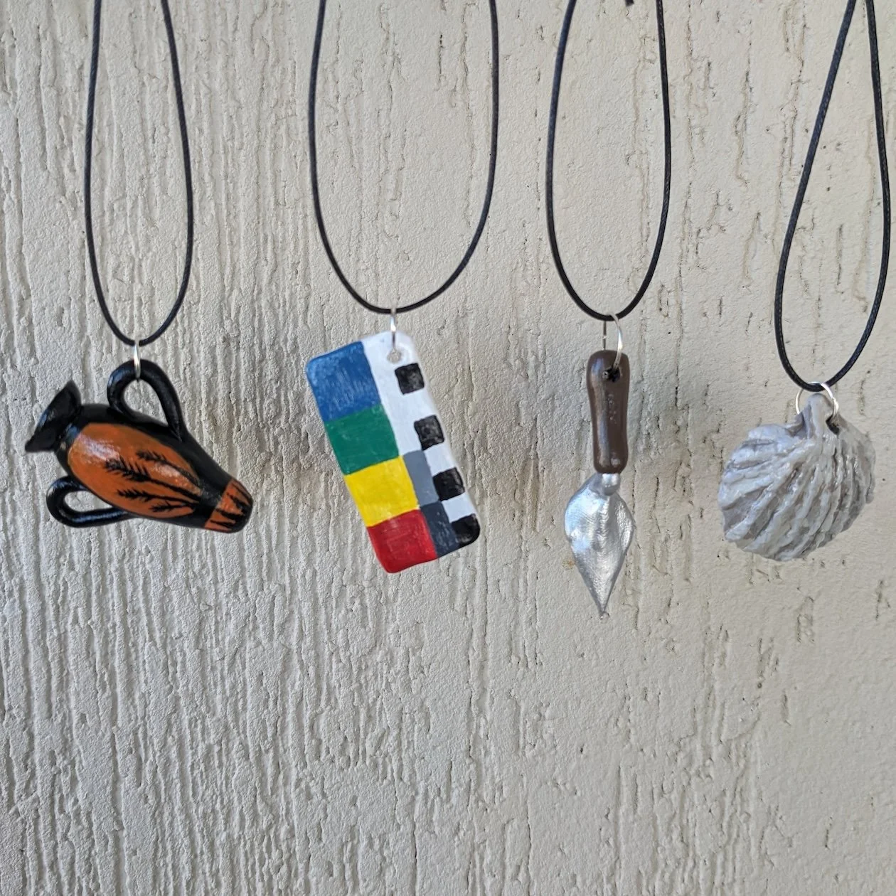 Clay archaeological pendants - Emma Rehn.jpg
