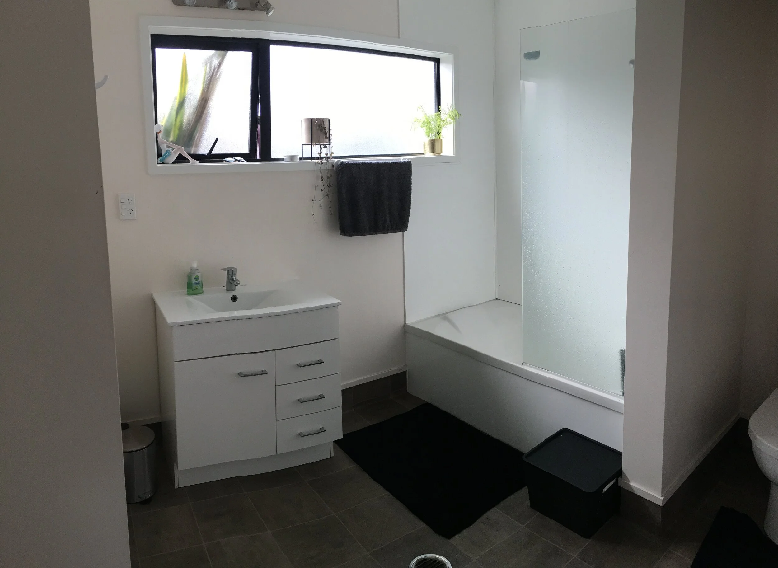 Bathroom with shower over bath