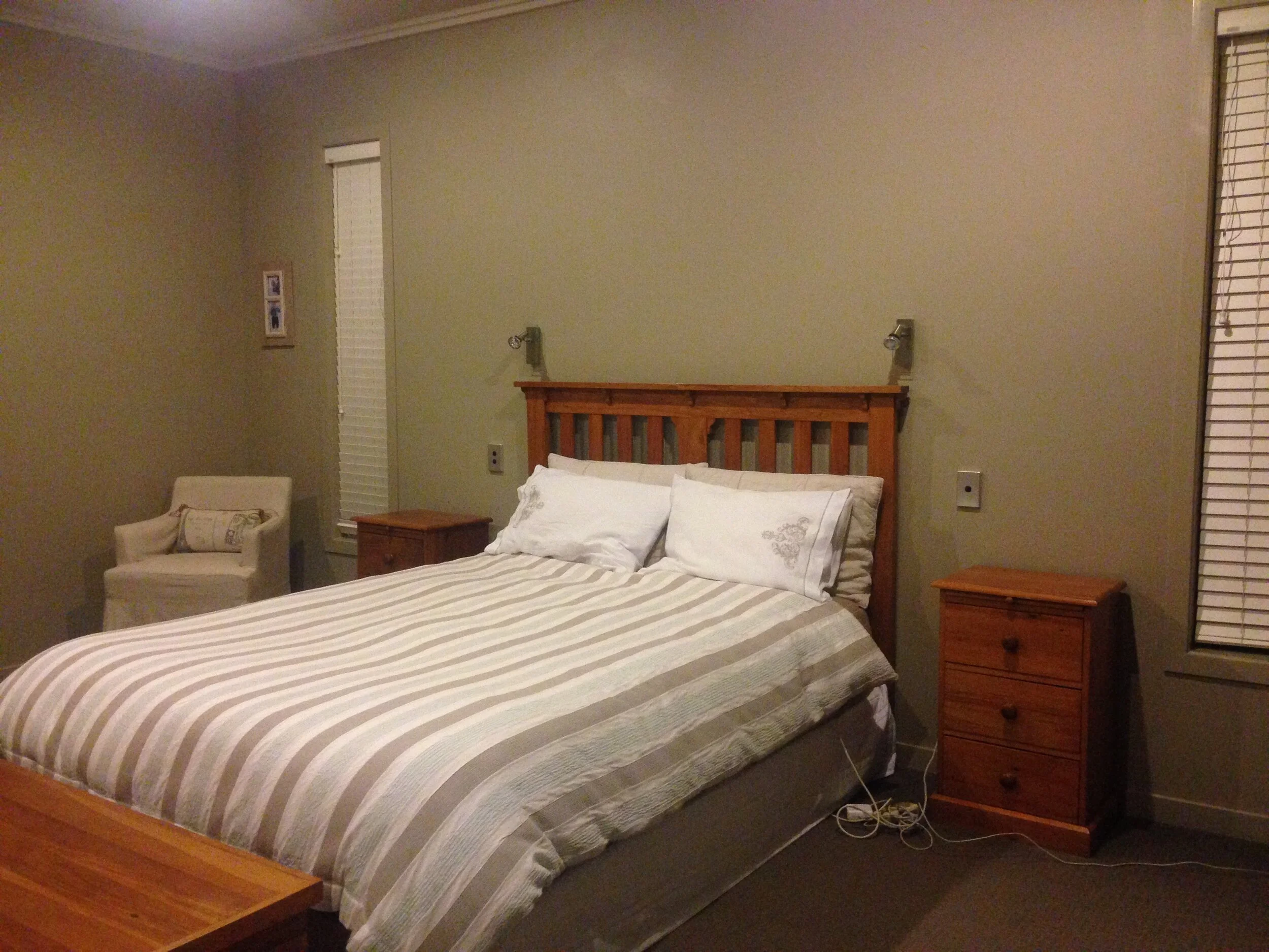 Main Bedroom with ensuite (with walk in shower and spa bath) and Walk in wardrobe plus patio doors.