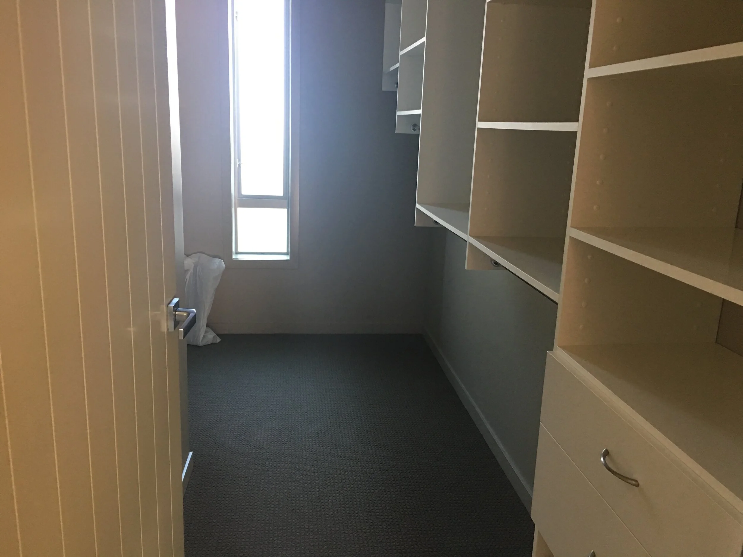 Walk in wardrobe in master bedroom