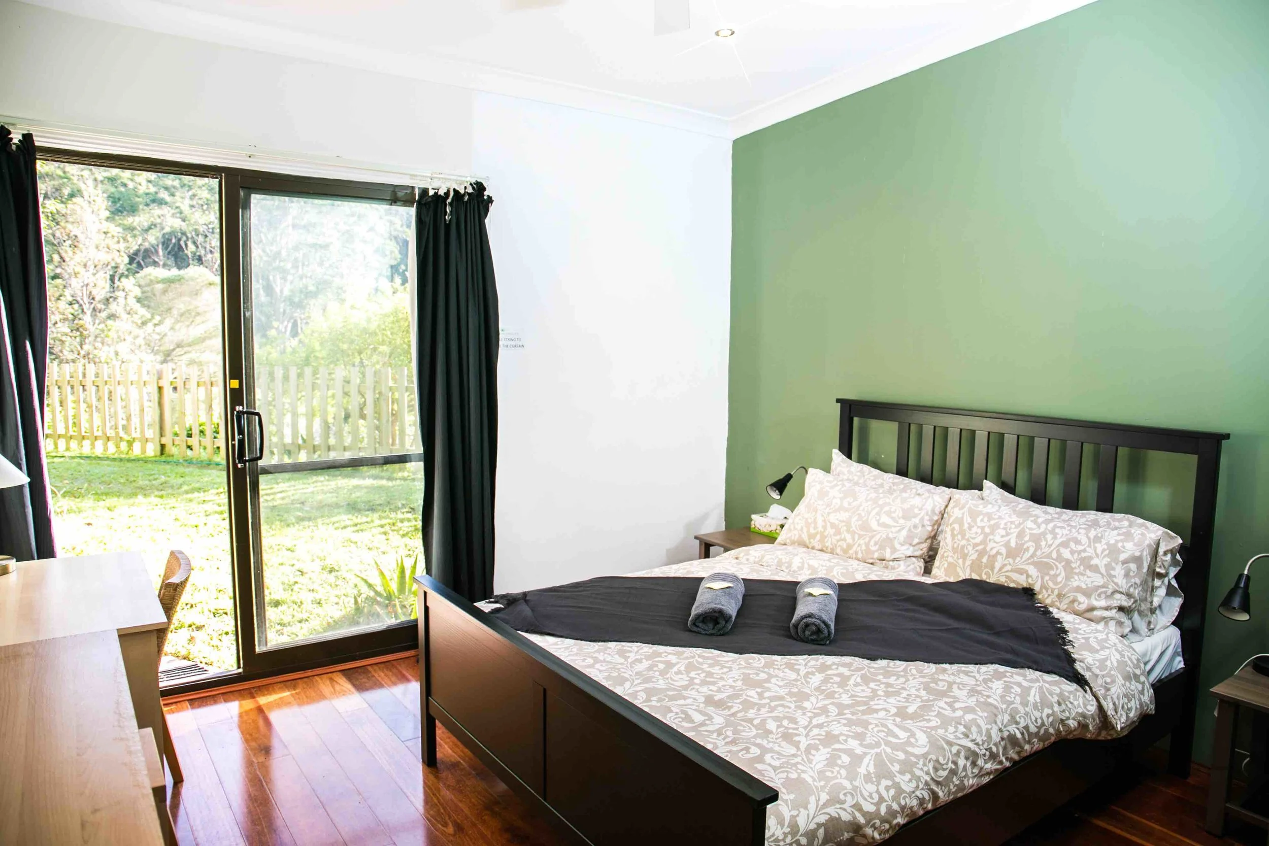 PACKAGE 2 - QUEEN BED + SINGLE BED W/ ENSUITE Features: Private Bathroom, Queen Size Bed + Single bed, polished wooden floors, fans + heater, free high speed WiFi, free parking