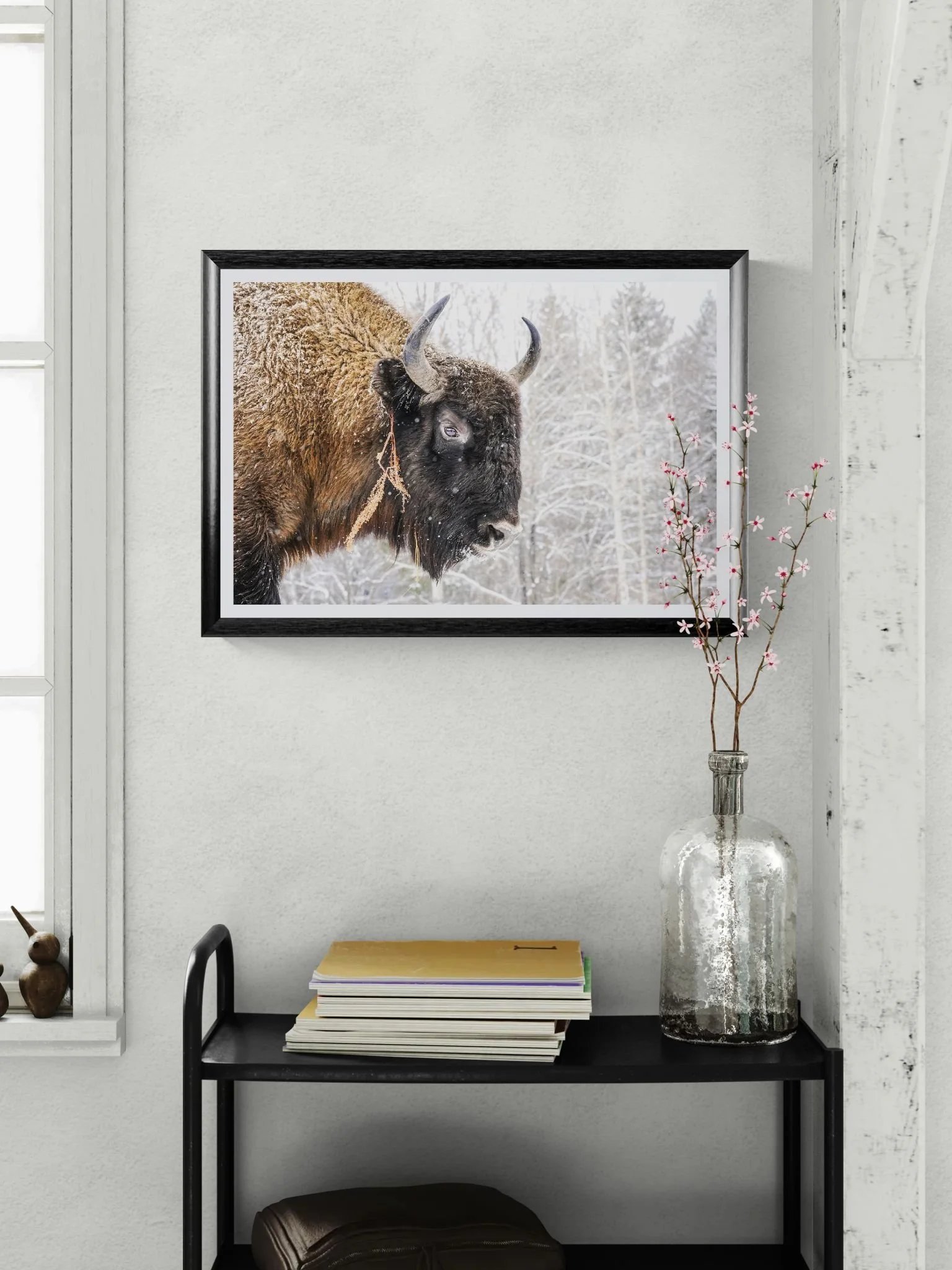 Close-up of a trolley with flowers and books.jpeg