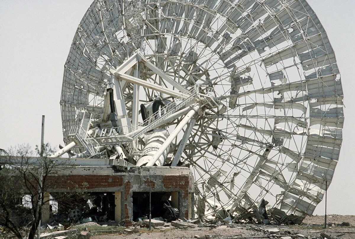 A satellite communications antenna destroyed during Operation Desert Storm. U.S. Department of Defense / Tech. Sgt. Joe Coleman