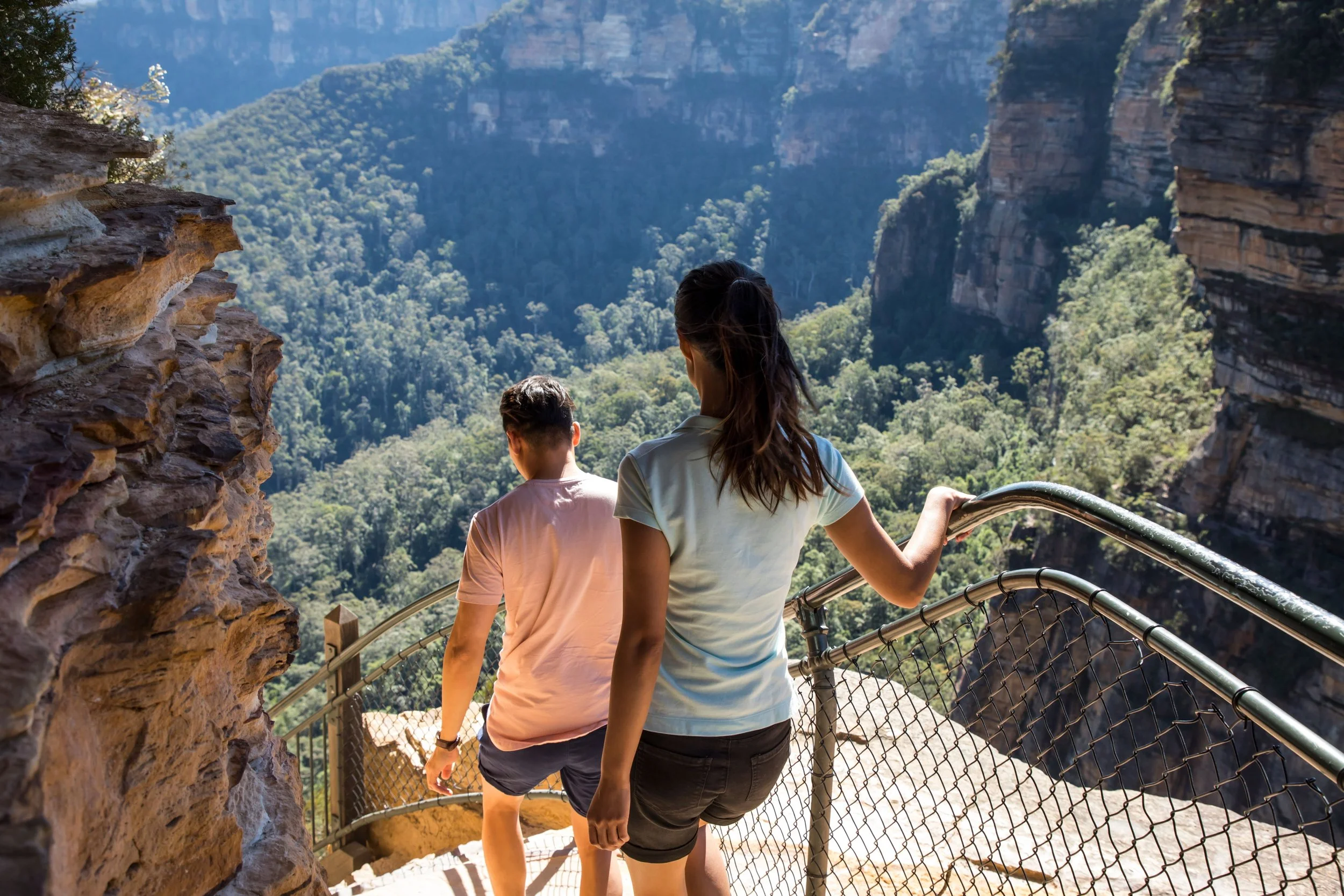 Guide with guest descending the Giant Stairway walk at Wentworth Falls
