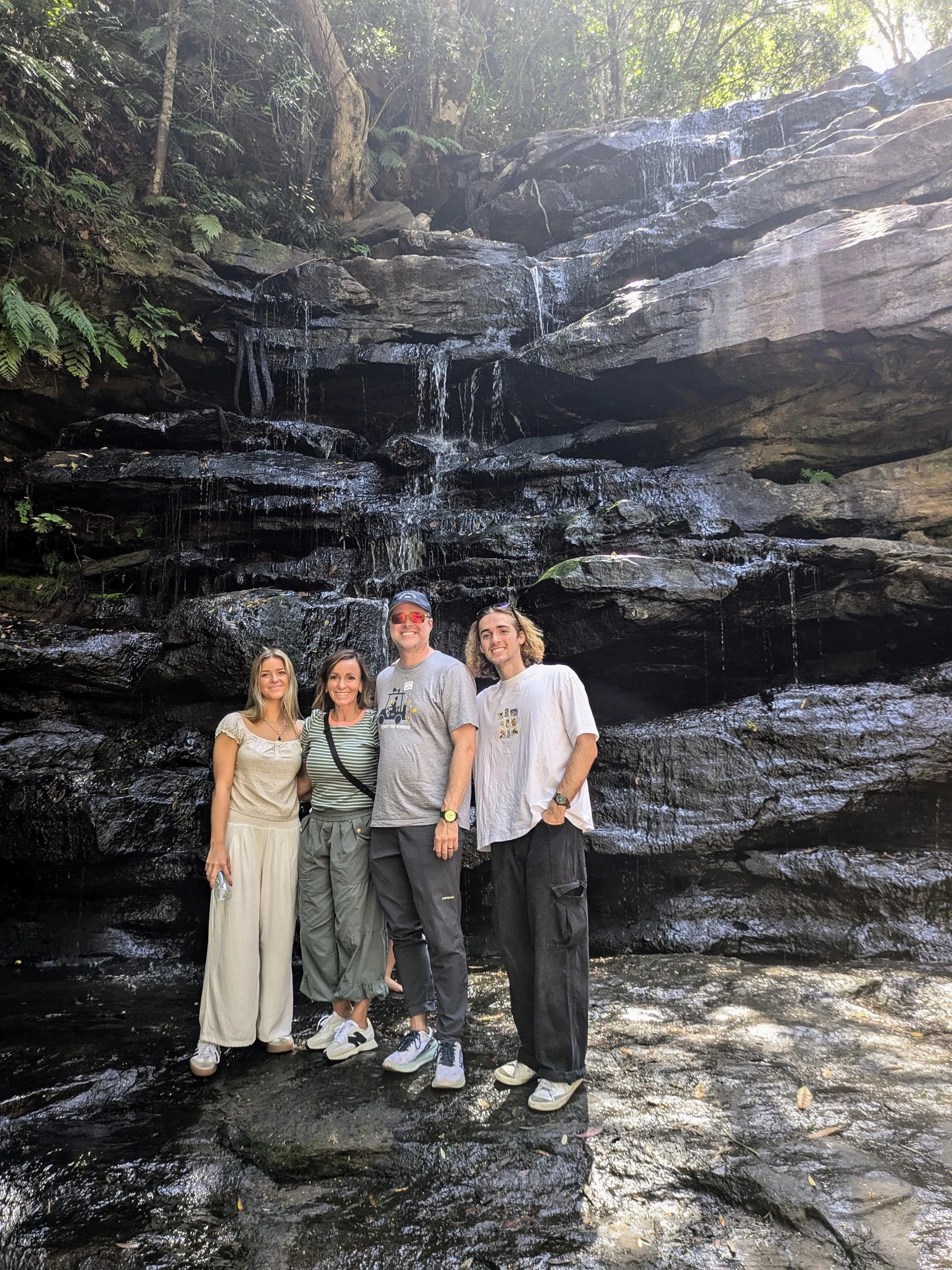 Waterfall walk on family fun tour