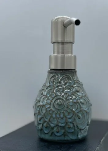 Small lotion/soap/oil dispenser