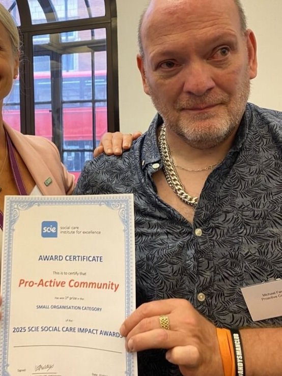 Winners!!!  Michael collects the First Prize at the SCIE Social Care Impact Award 
