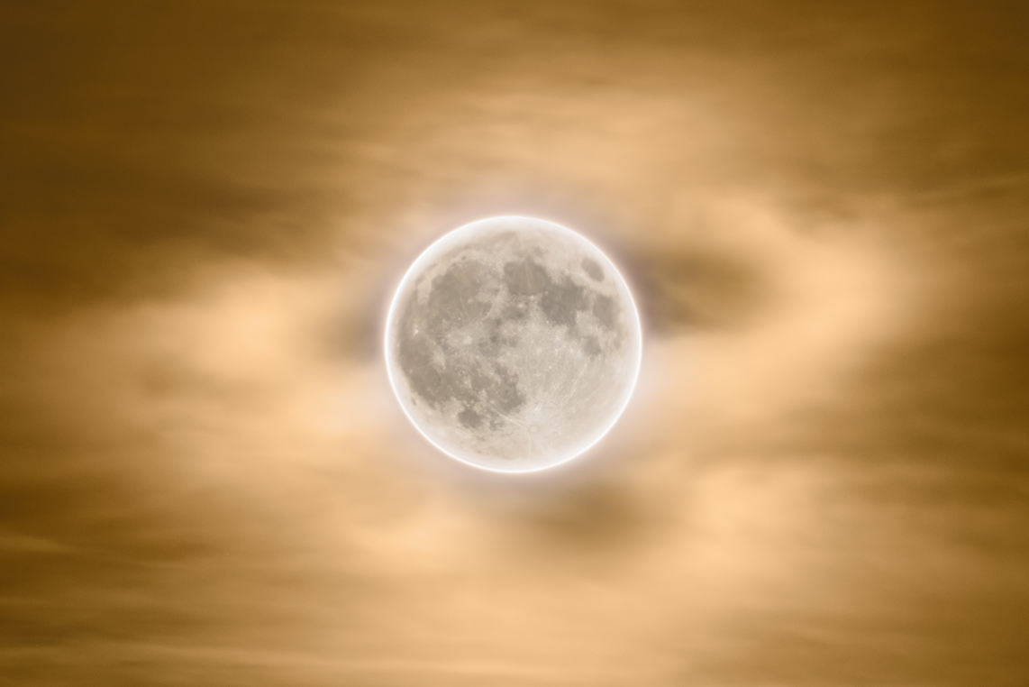 A double exposure of the Full Moon. In this case, the longer exposure also revealed foreground cloud details