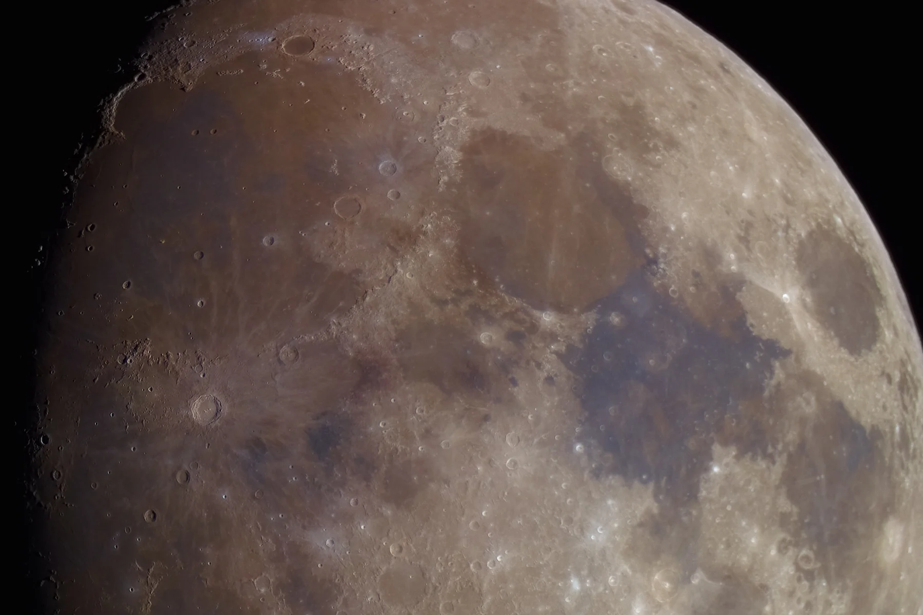 While the saturation in this image has been increased, these colors are perfectly visible to the human eye when observing the Moon, especially in the color contrast between the Seas of Tranquility and Serenity