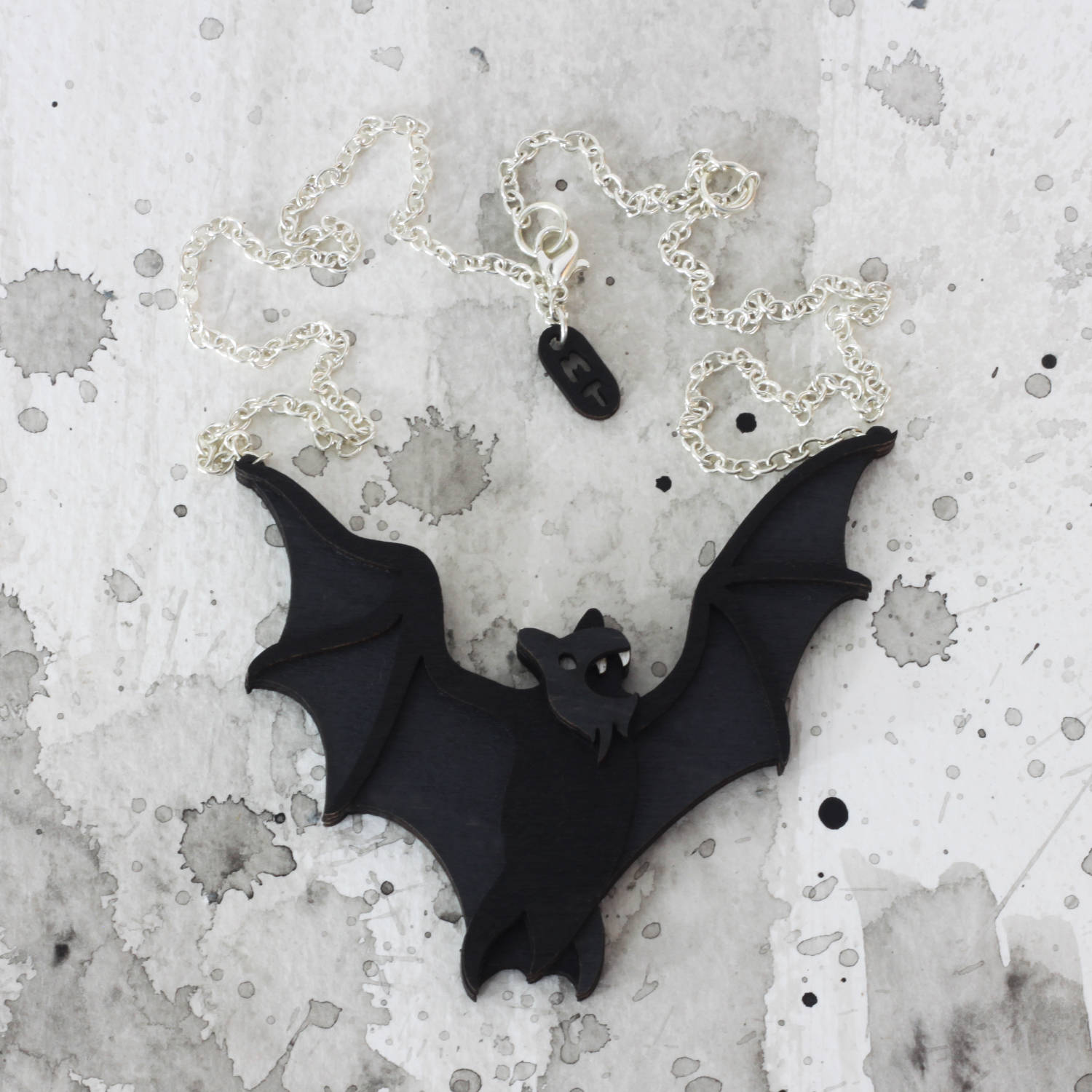 Omens Splat Bat necklace.jpg