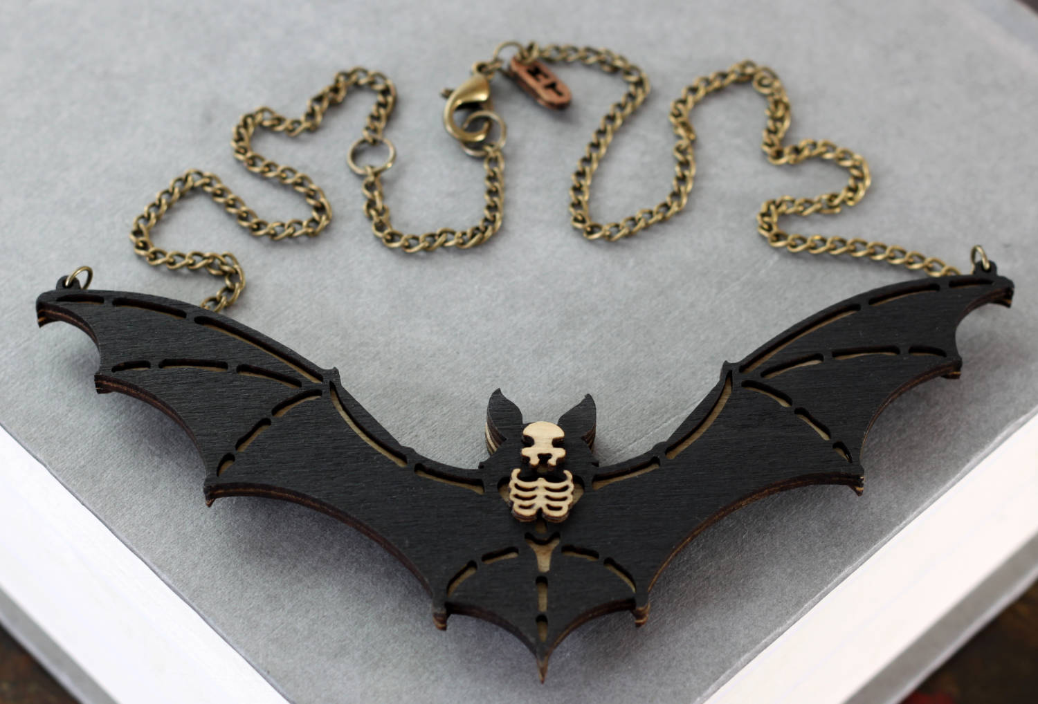 Bat Necklace Back Book.jpg