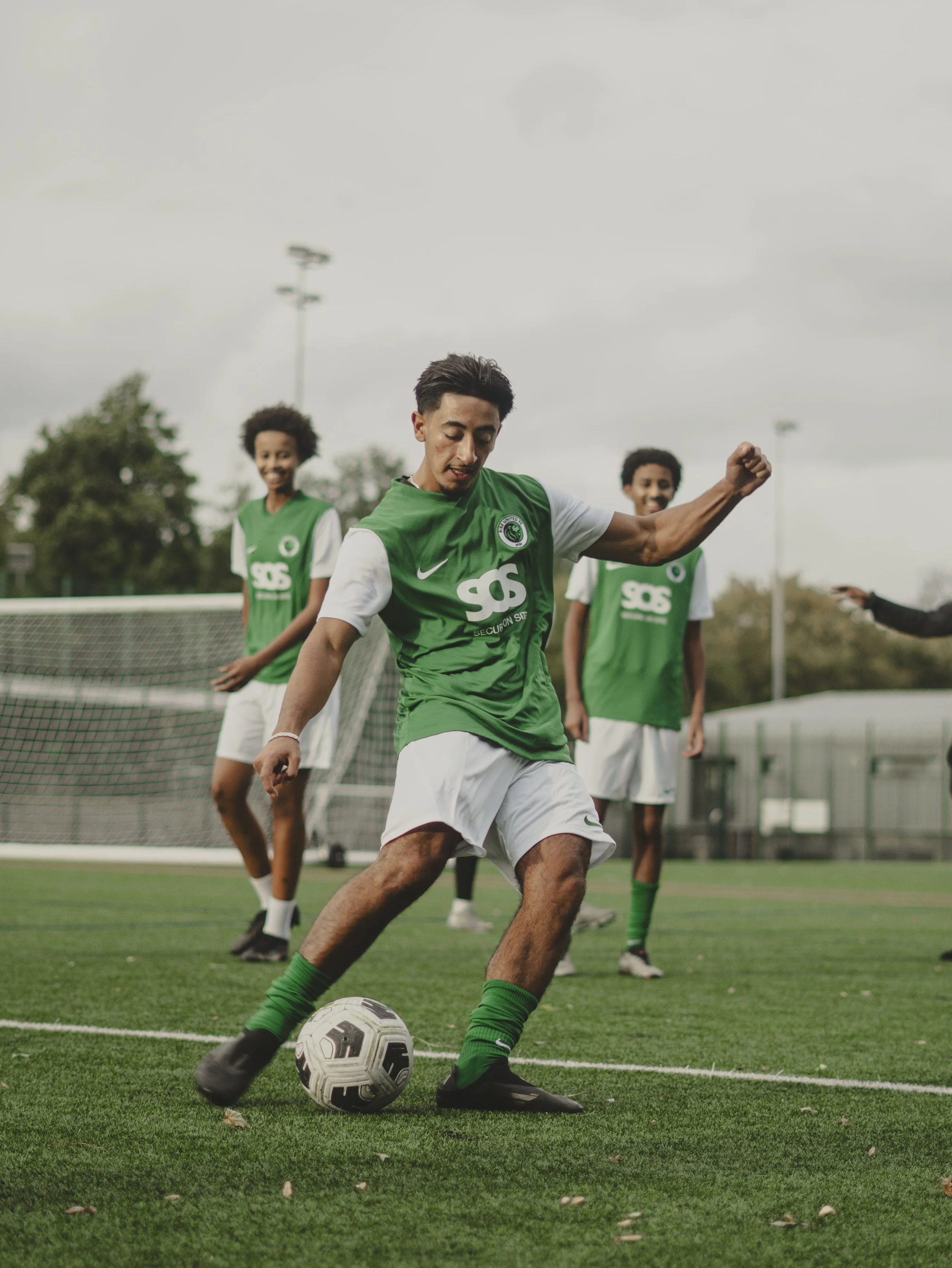 RISE United FC Debuts New Kit Sponsored by SOS Security at Market Road Summer Tournament