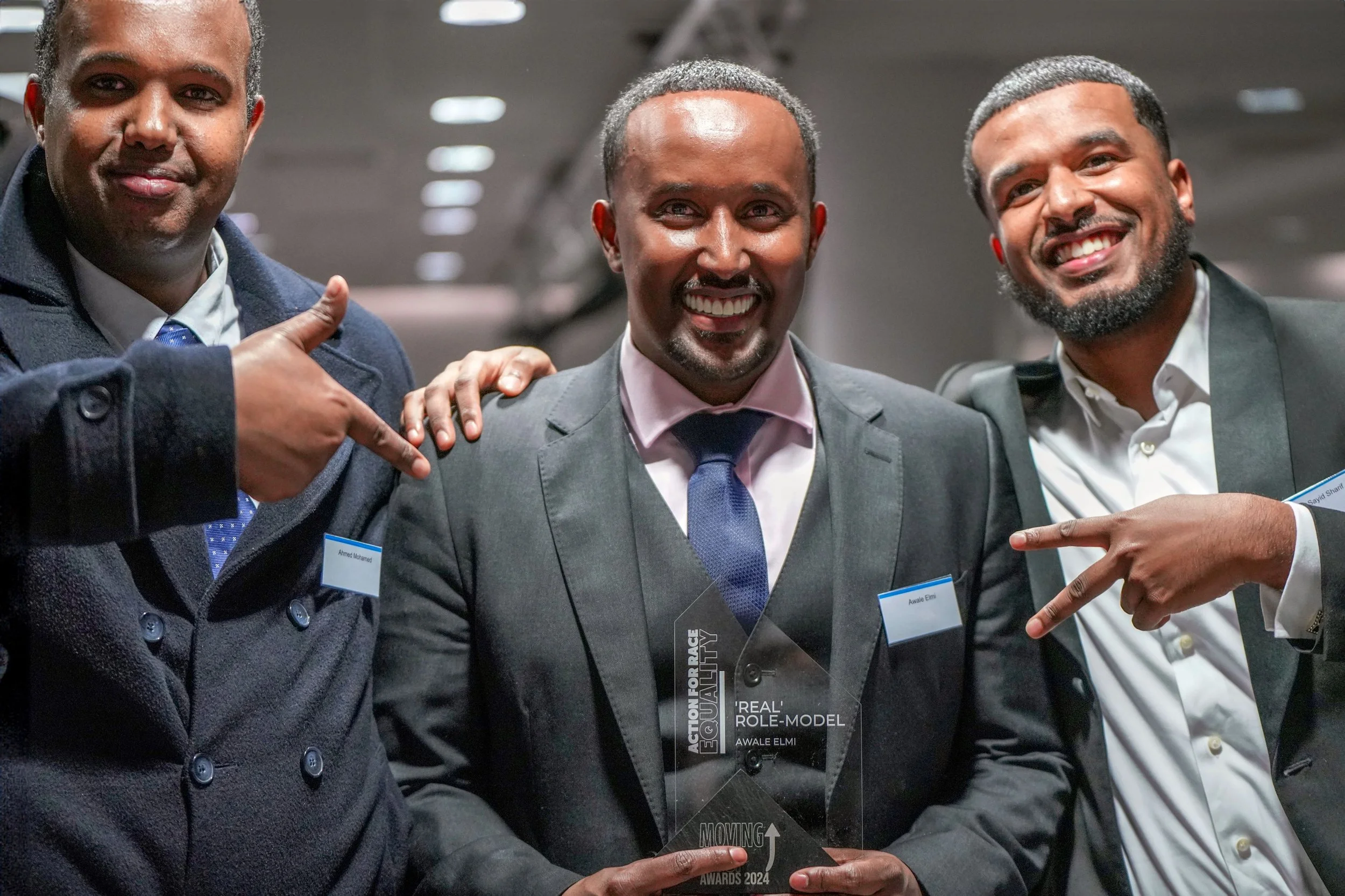Awale Elmi receiving the Real Role Model award at the Moving On Up Awards 2024