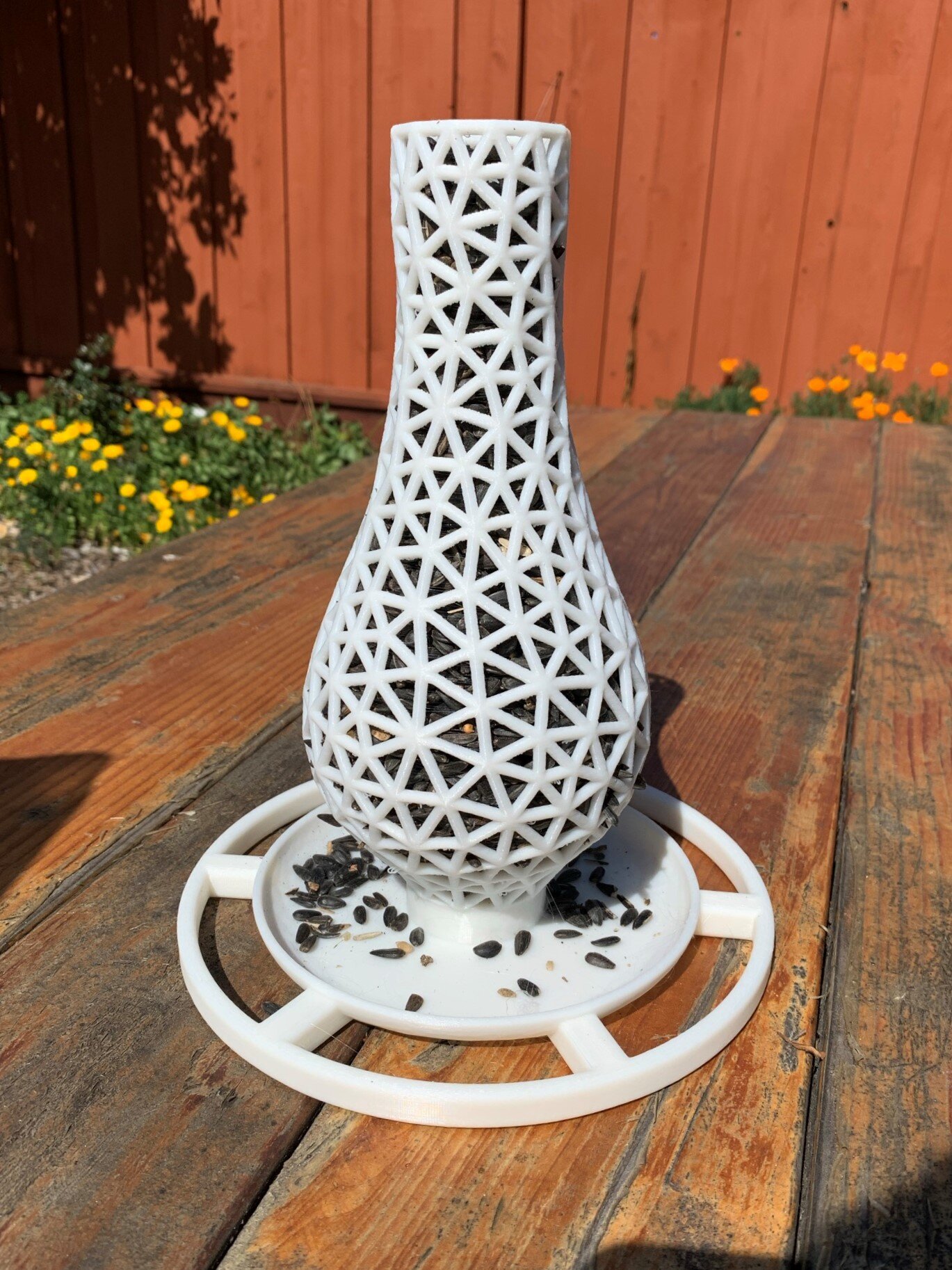  Iteration 2 of my birdfeeder! The main design changes were to strengthen the member thickness, smooth out the mesh, and to add a feeding dish/ledges. 