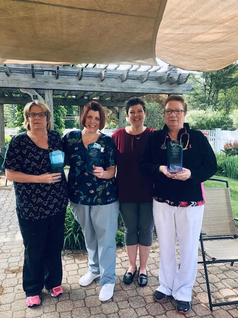 Kathleen Toscano, CNA (on left 32 years of service), Christine Beaton, CNA (33 years), Patrice Lago, DNS and Leslie Degregorio, LPN (35 years).