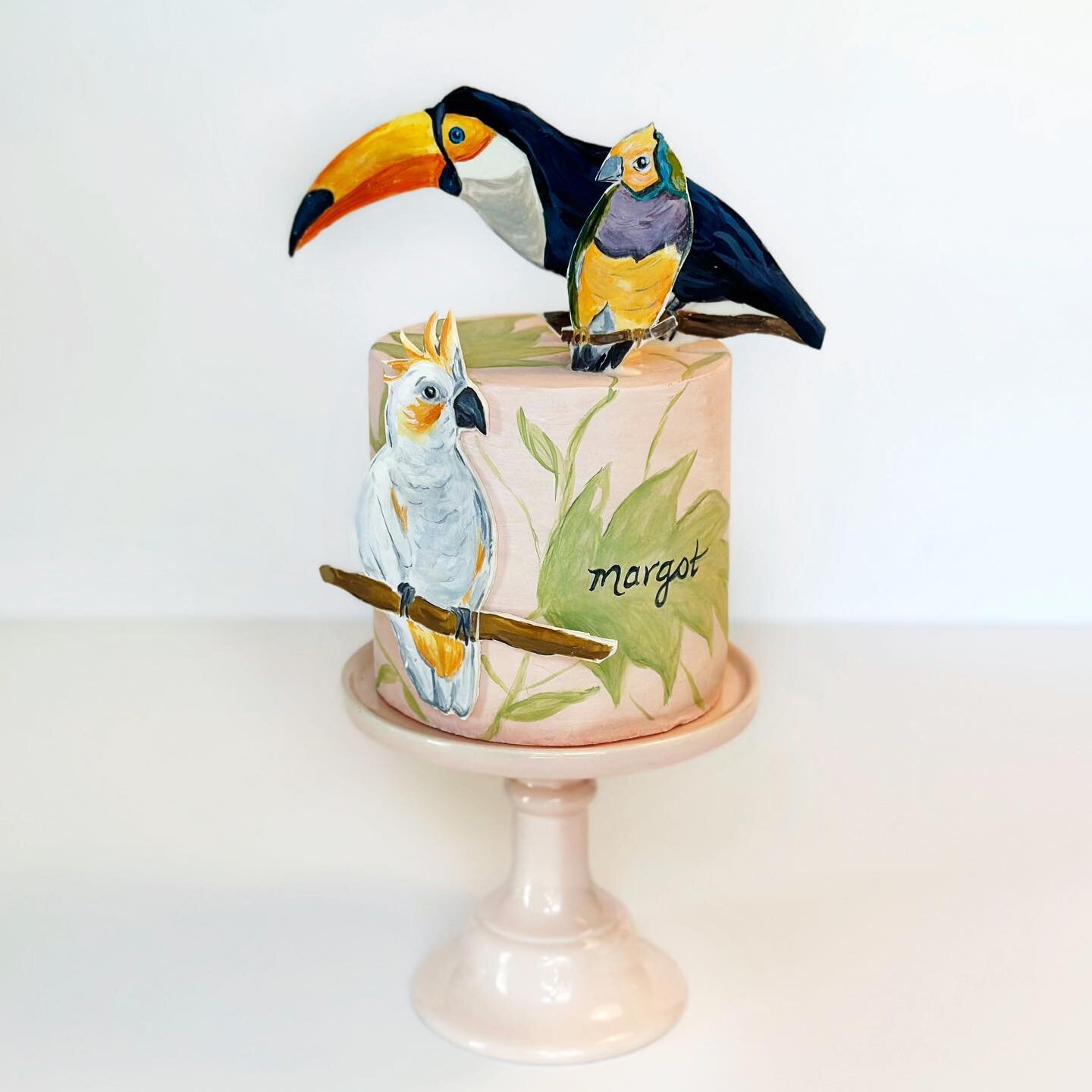 Margot&rsquo;s very first birthday cake! Wanted to share a better photo of the cake I made to celebrate Margot&rsquo;s introduction to the world - and of course another baby photo :)
Featuring hand painted tropical birds and layers of dark chocolate 