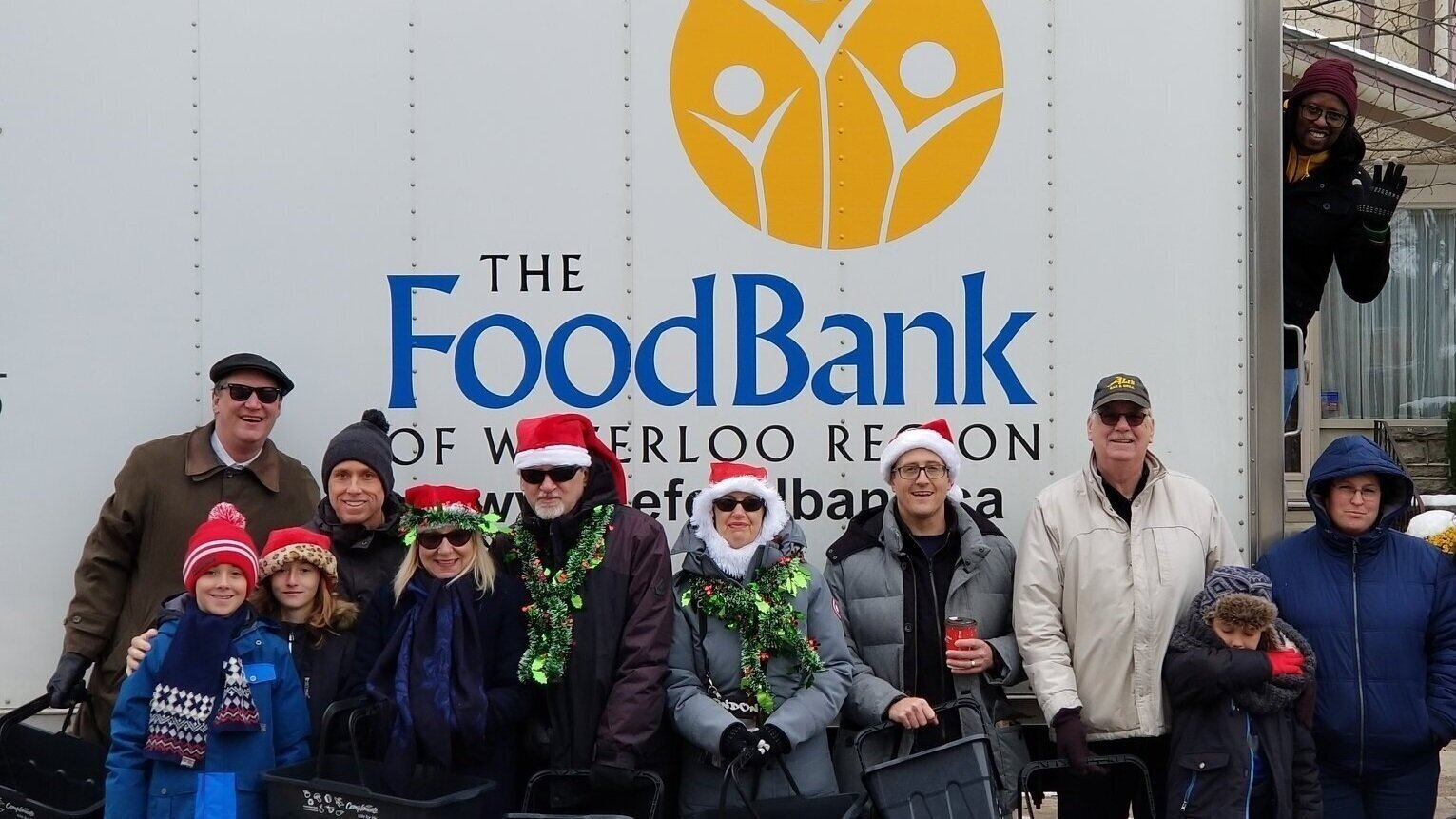 Co-ordinating food bank collection volunteers for the Lions Club Santa Claus Parade