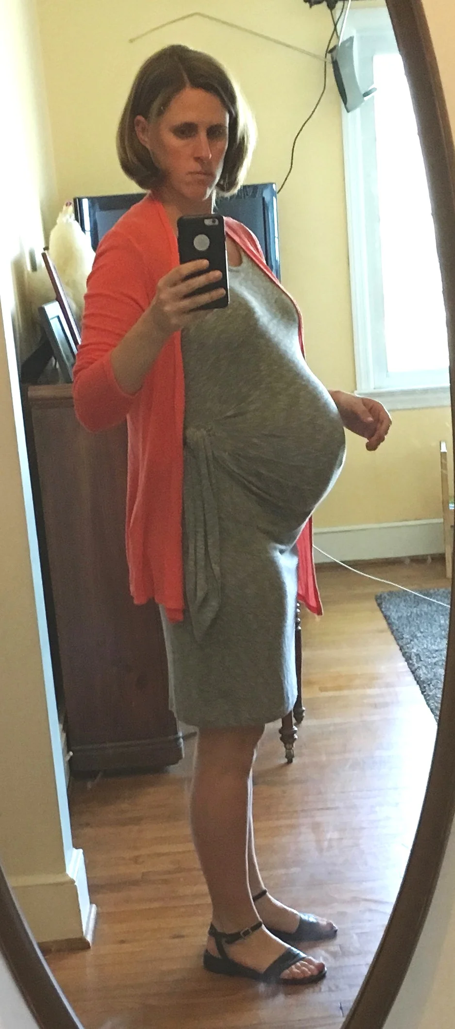 My last day of work. Sent this pic to some friends showing them I could still fit into the dress they had given me.