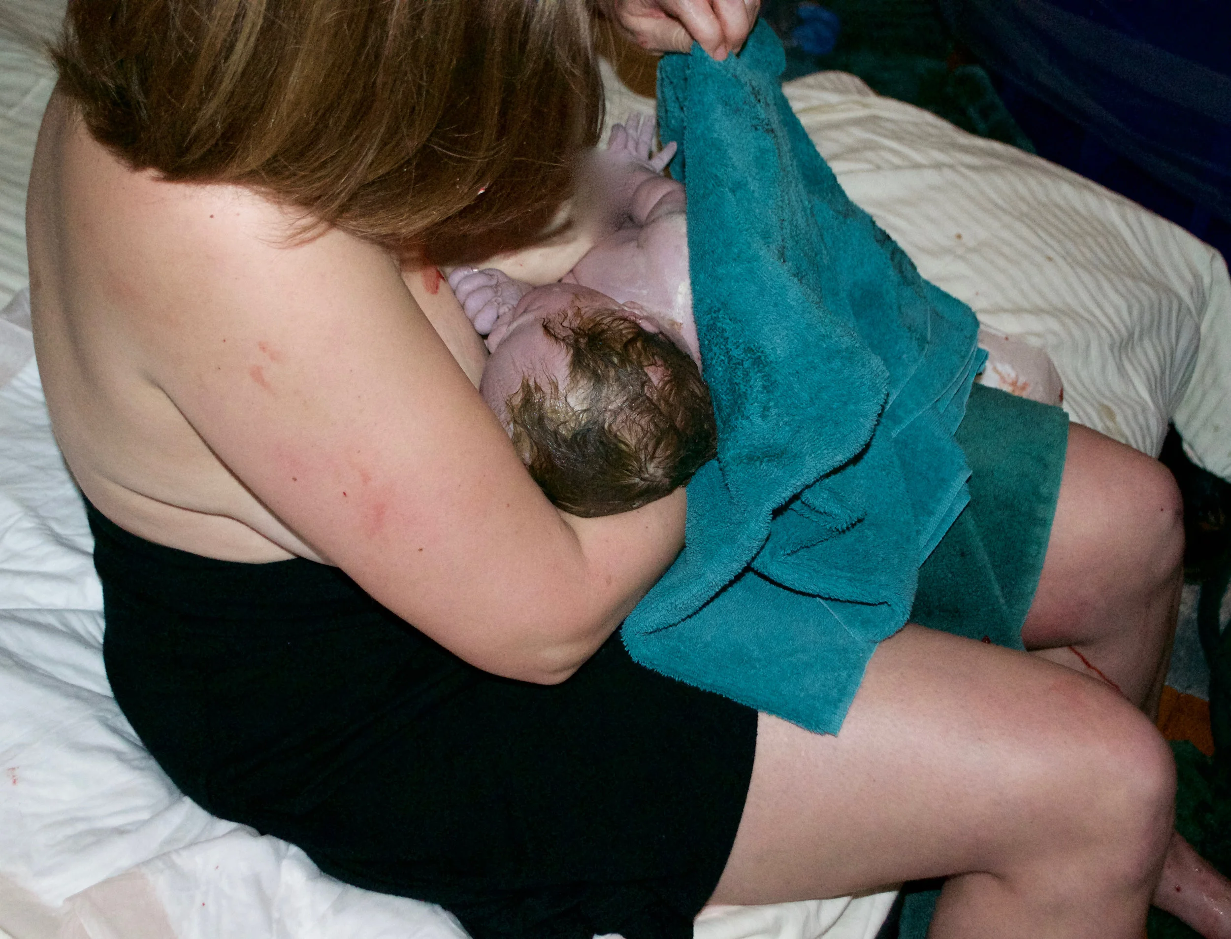 Sitting down right after she was born