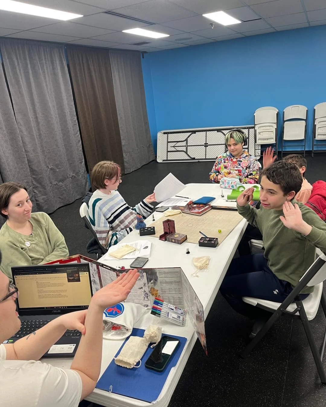 Mugging to the camera while the rest of your group fails to negotiate with your Dungeon Master. 

Jonathan loves giving inspiration, hit points or other perks to the players who took good notes from week to week. If even one player can answer the ski