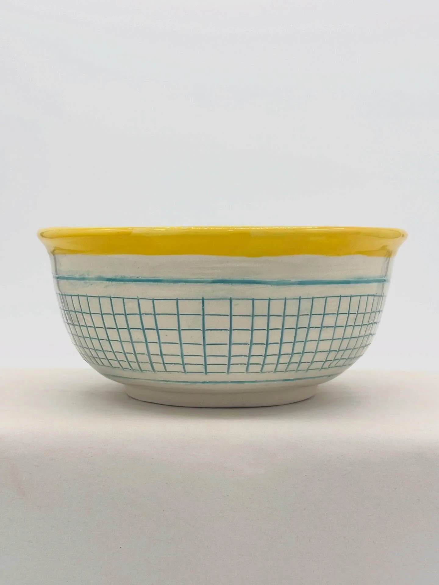 Last pieces of the year are out of the kiln!

I had some trouble with oolites in my clear glaze, making all 3 of these pieces seconds. But! I&rsquo;m happy with how cleanly I wiped away the underglaze and with how deep the lines are. 

Happy to say I