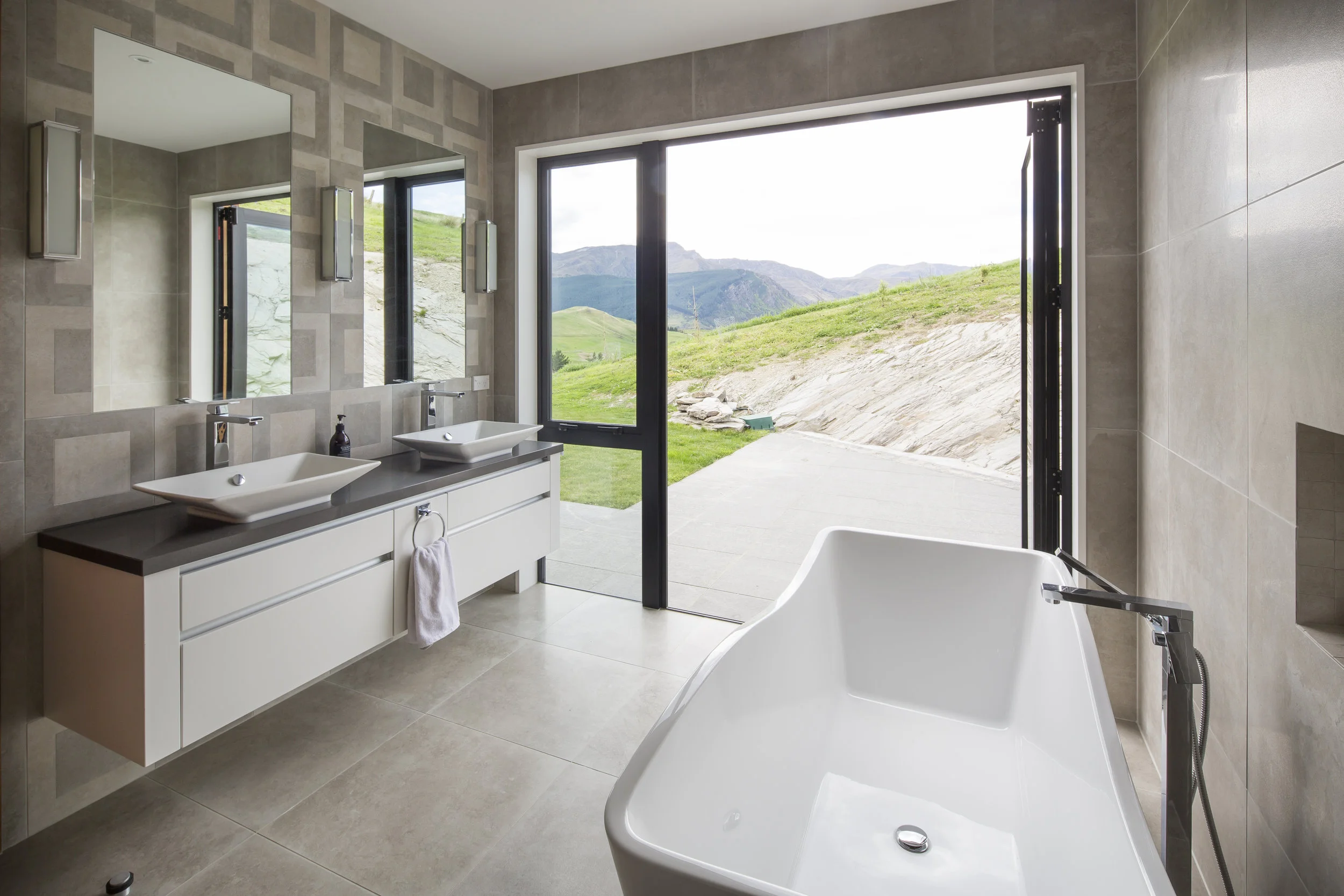 Interior fittings had to complement, not overtake the breath taking views of Coronet Peak and surrounding mountains
