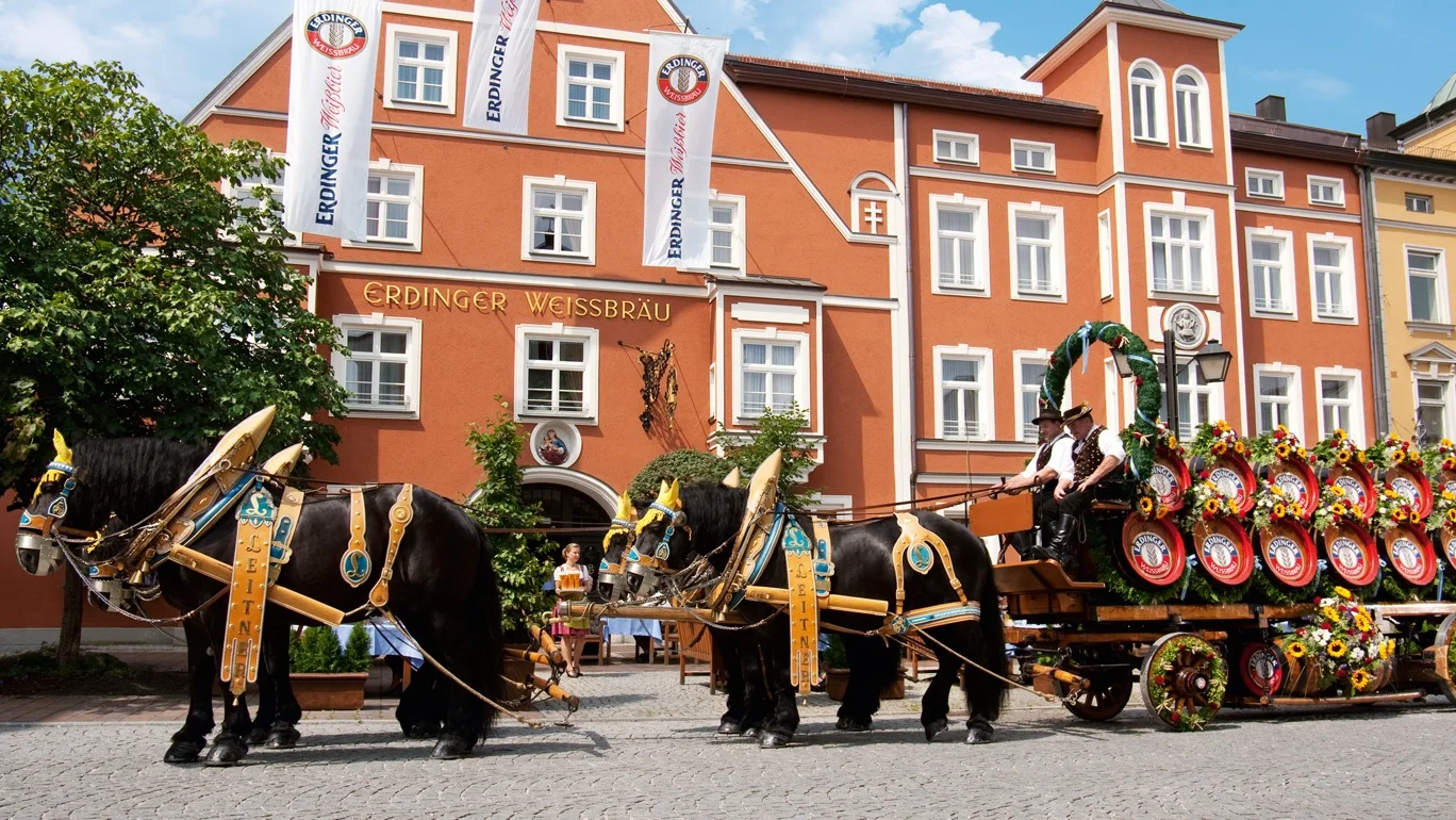 A horse drawn carriage outside the Erdinger Weißbräuhof, a restored building which serves as the brewery’s HQ, a pub and a four-star hotel