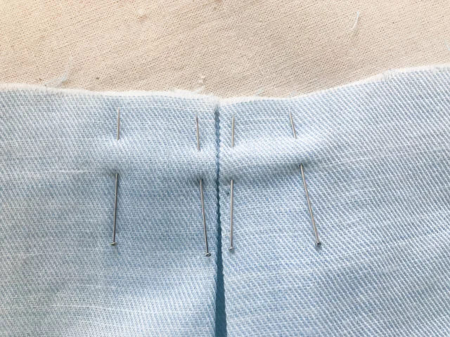 Inverted box pleat on the right side