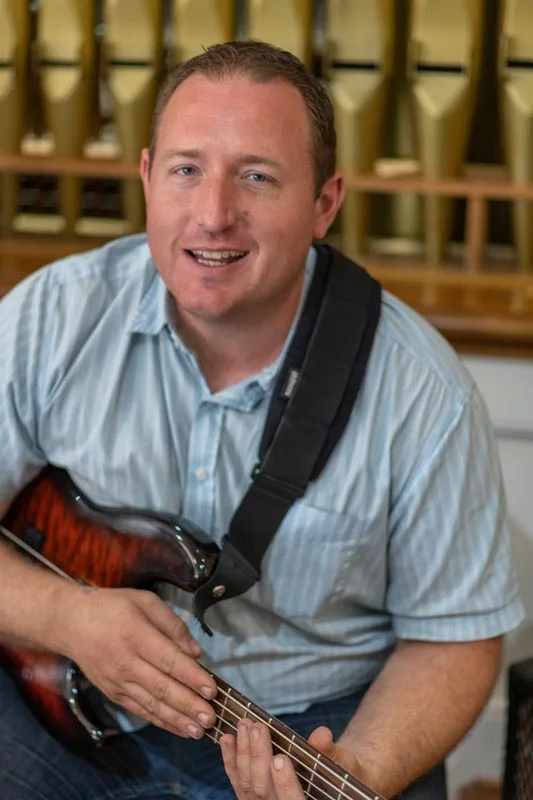 Chris Finet plays regularly with First Church UCC Phoenix's Worship Team as well as with many of the state’s top jazz artists and historically has performed with jazz luminaries such as Jerry Bergonzi, Roy Hargrove, Dave Douglas, John Tchicai, Irvin Mayfield, and many others. An active bassist and national educator, Chris is currently a professor and Director of Jazz Studies at Northern Arizona University in addition to maintaining an active performing schedule. As a classical musician Chris is the Principal Bassist of the Flagstaff Symphony and performs often with the Phoenix Symphony, Arizona Opera, and freelance orchestras throughout Arizona. While living in NYC Chris held positions with the Chamber Orchestra of New York, Philharmonic Orchestra of the Americas, Harrisburg Symphony Orchestra, Allentown Symphony Orchestra, Binghamton Philharmonic, Glens Falls Symphony Orchestra, and regularly subbed with orchestras throughout the Northeast. He has appeared as a soloist with the Flagstaff Symphony Orchestra and North Valley Symphony Orchestra. In addition, Chris is an active participant in the theater and commercial music worlds, playing for numerous Broadway touring productions, entertainers such as Don Rickles and Joan Rivers, and commercial productions such as the Latin Grammy Awards, Game of Thrones Live Concert Experience, and more.