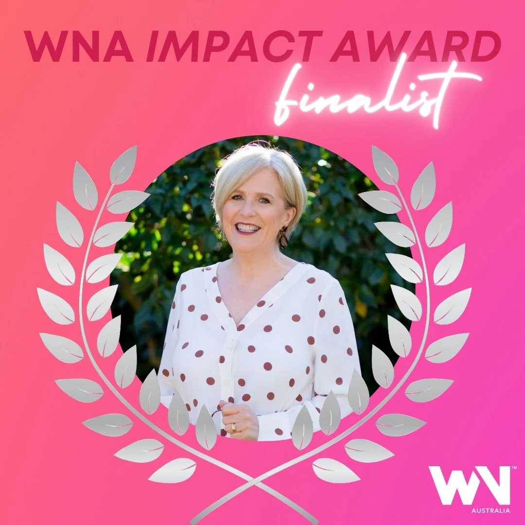 Award finalist announcement with person smiling, wearing a white polka dot blouse, surrounded by a laurel wreath. Text reads "WNA Impact Award Finalist." WNA Australia logo is displayed.