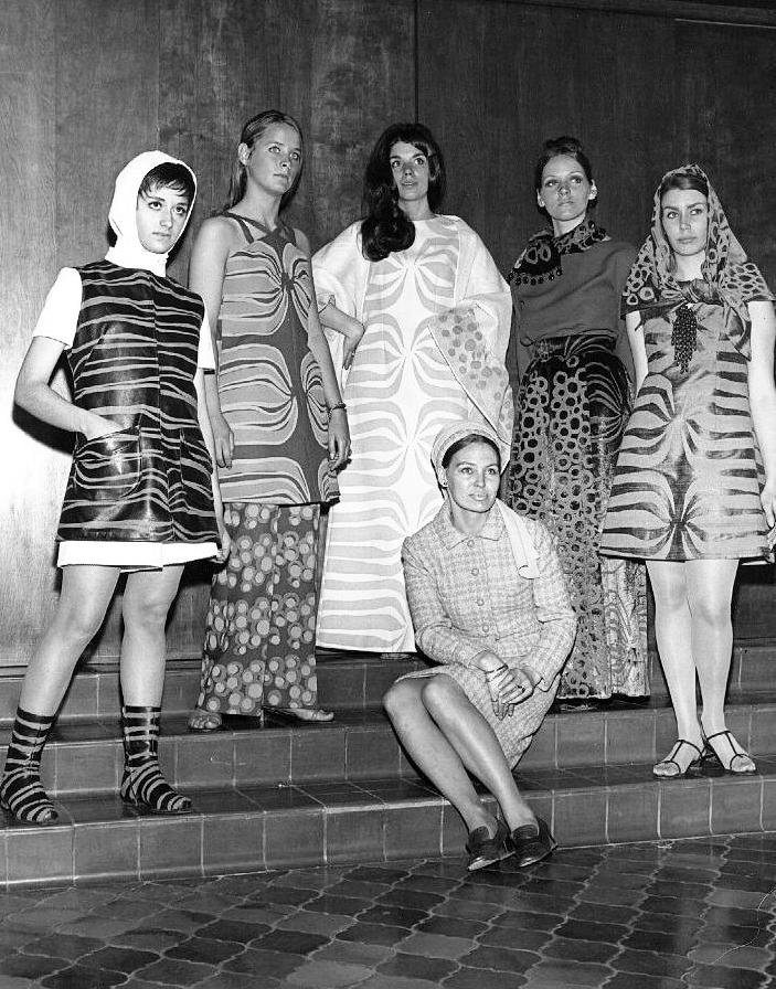 Six students posing with their final garments on