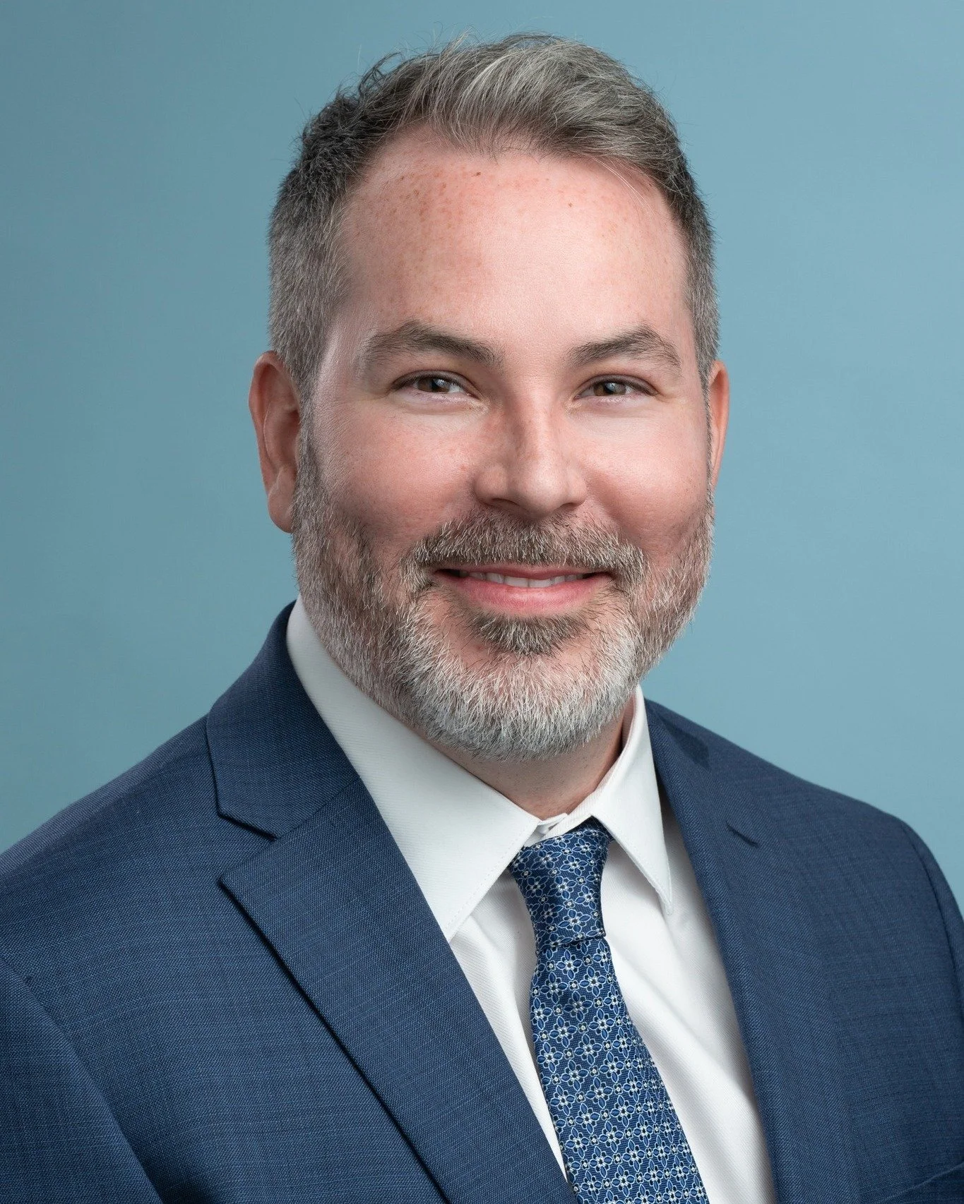 Ensuring continuity is key when maintaining a strong visual brand! I recently had the pleasure of capturing updated headshots for visiting executives from Harris Auto who were in town for meetings.

The goal? To perfectly match the style and quality 