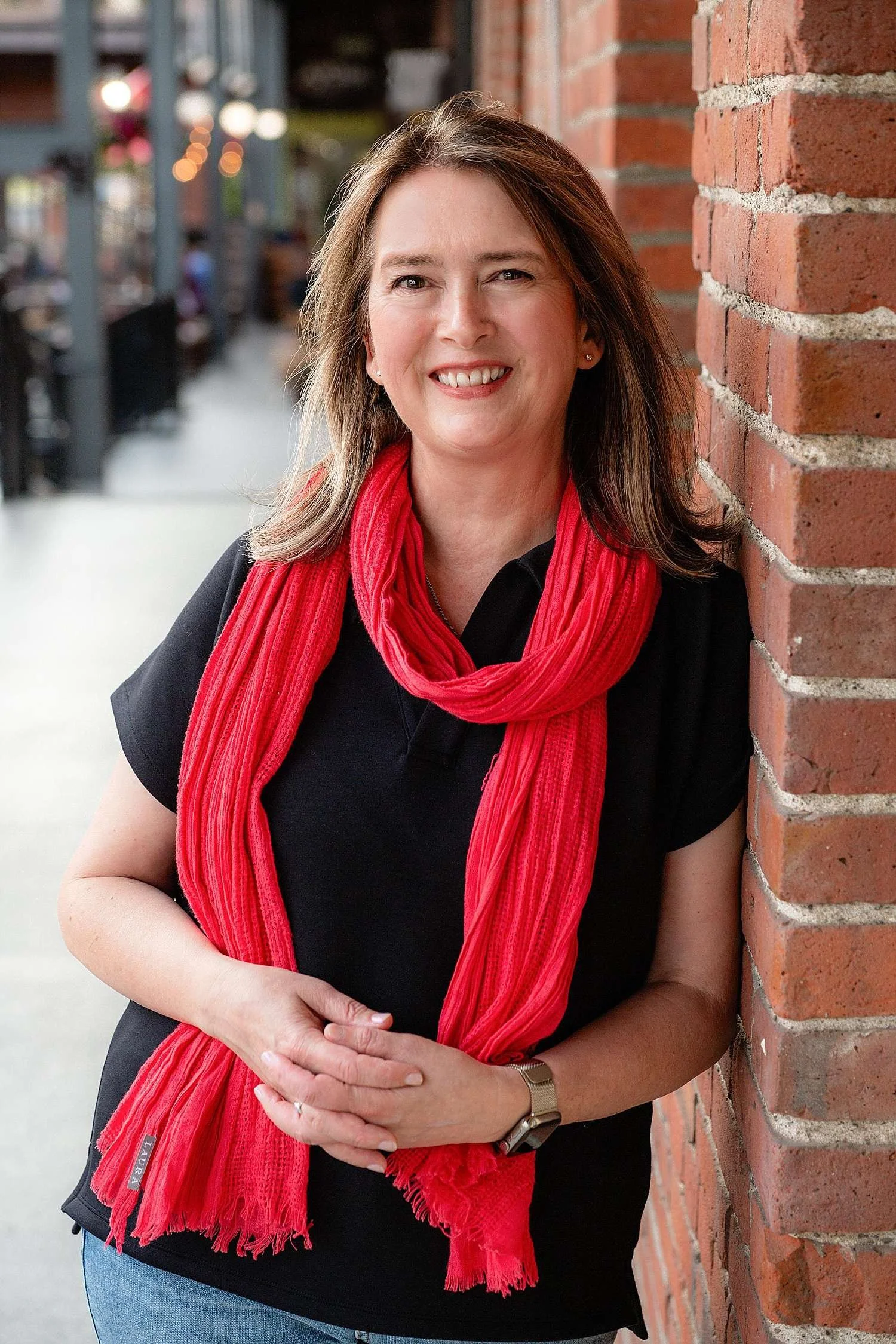 Outdoor branding headshot for a bestselling author in Victoria BC, capturing an authentic and approachable professional image in natural light by Erin Clayton.