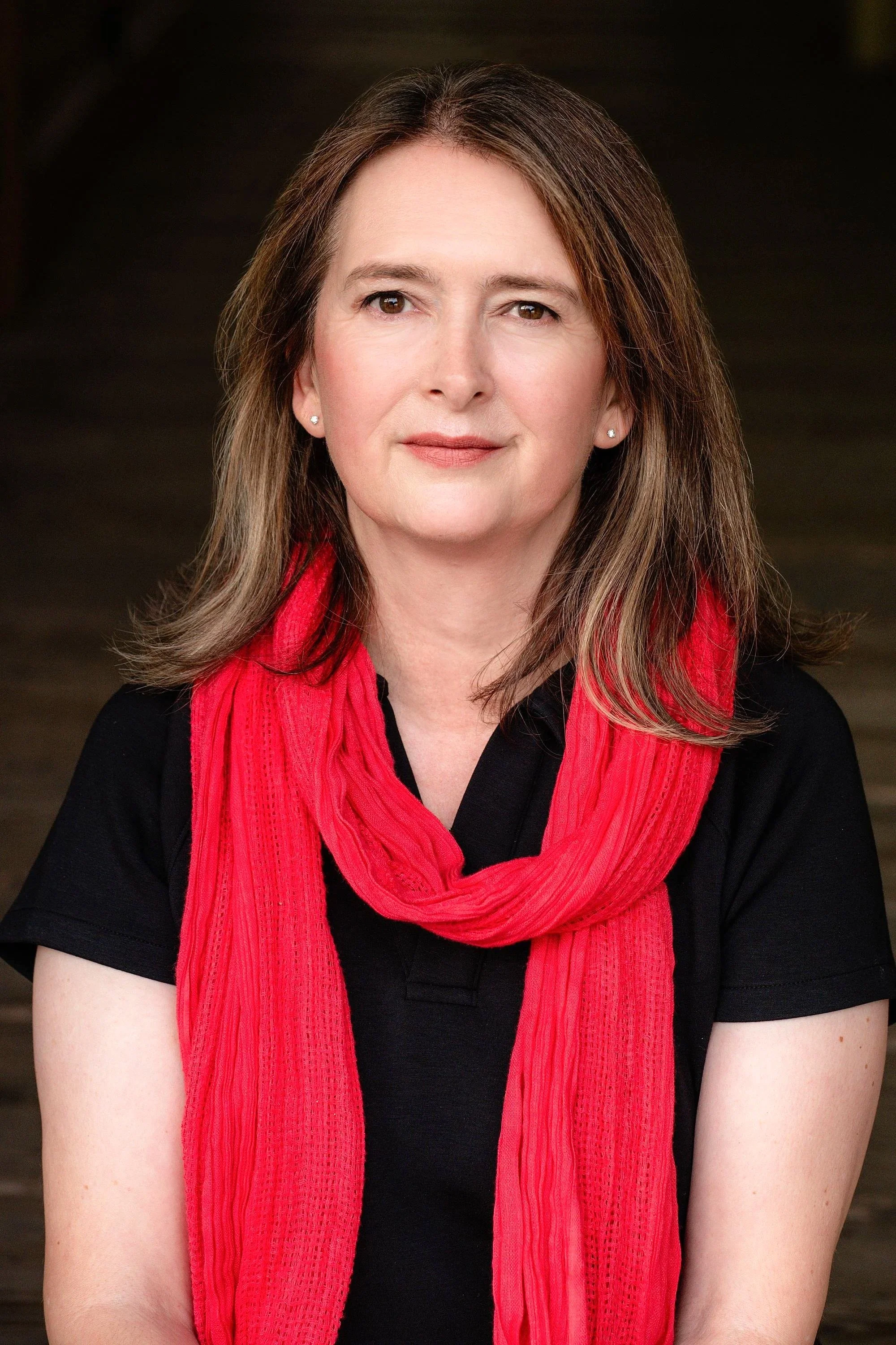 Outdoor headshot branding portrait for a new york times bestselling author, captured in natural light to create an approachable yet professional image for book jackets and media kits.