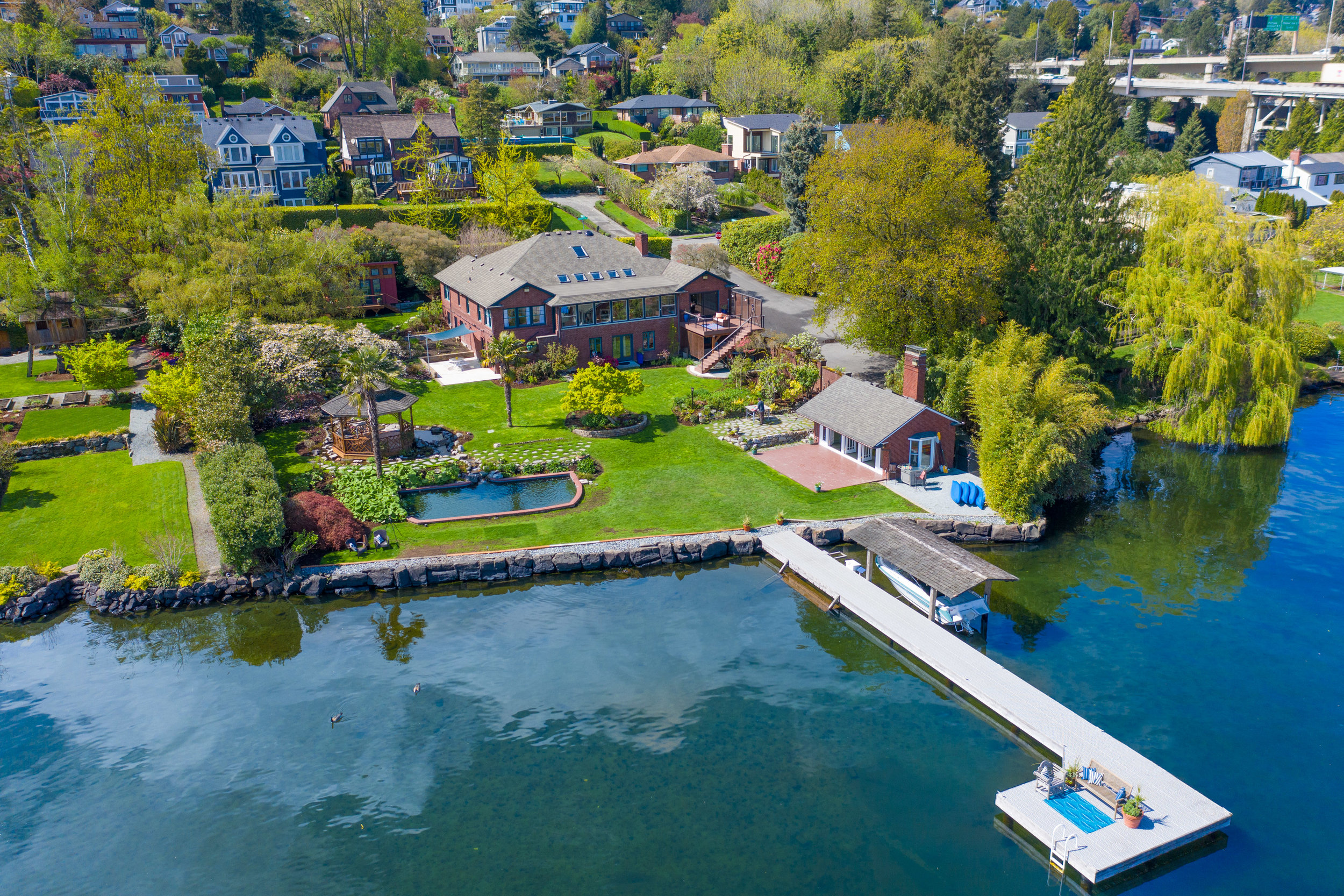  The Mount Baker Waterfront Estate, a private Lake Washington compound with magnificent protected panoramic views framing Mount Rainier. 