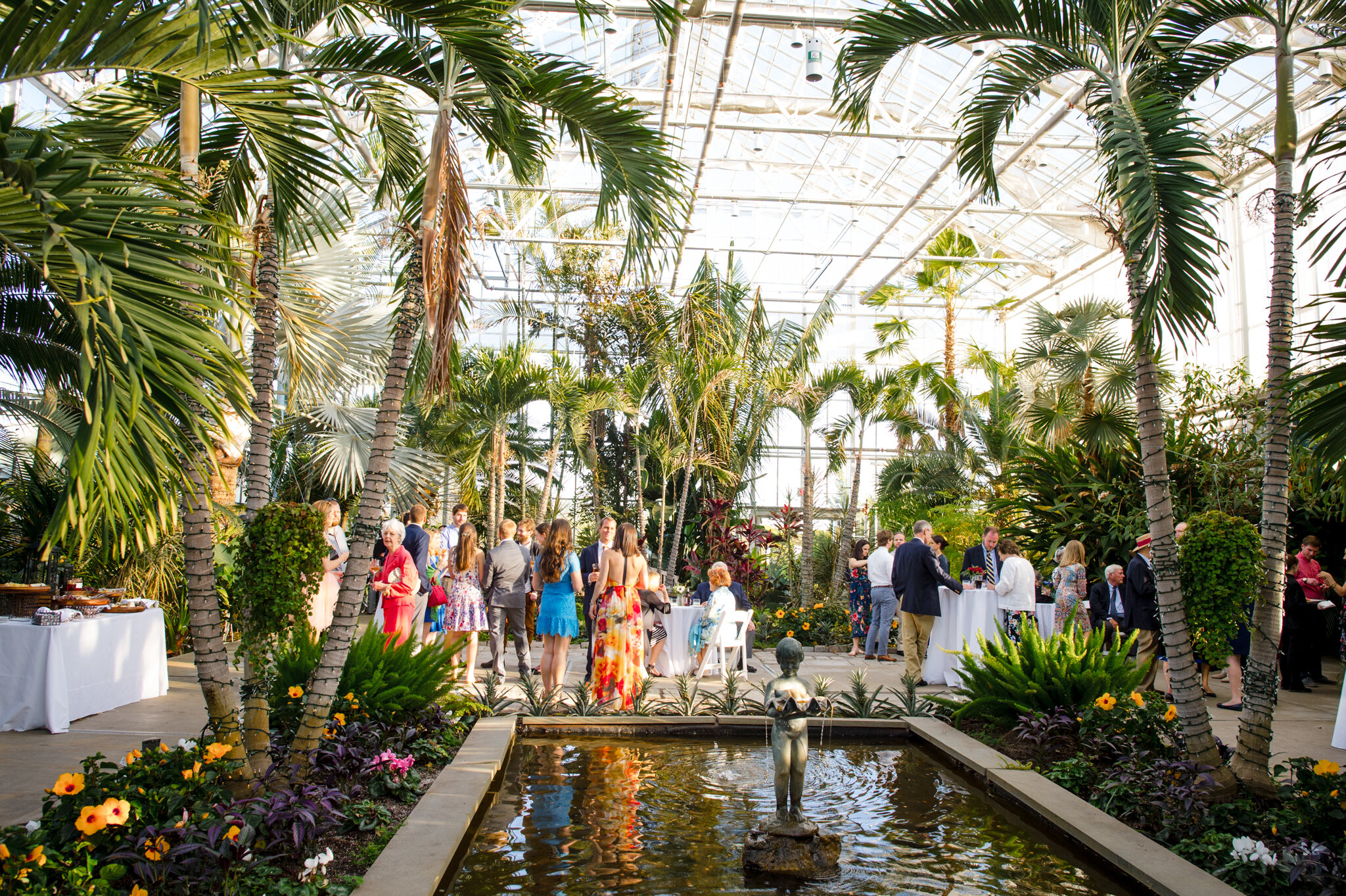 Wedding guests walk into reception at Roger Williams Botanical Center Providence Rhode Island Michelle Schapiro New England LGBTQ Photographer